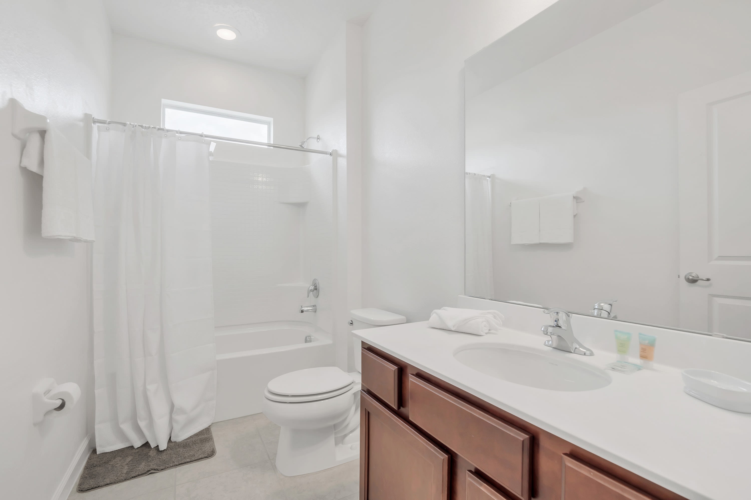 Sparkling Clean Bathroom With Shower And Bathtub Combination
