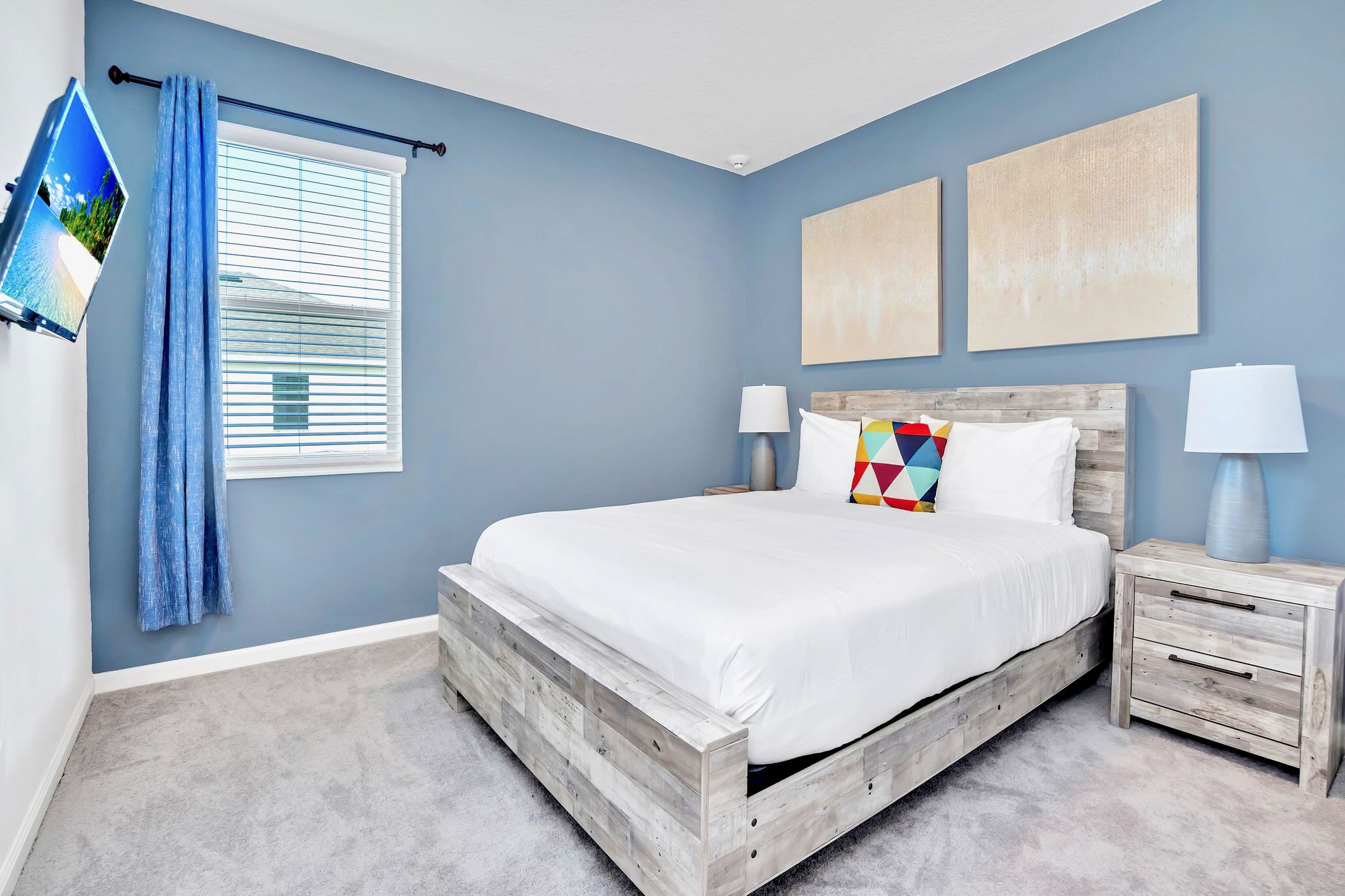 King Bedroom With Large Windows And Classic Neutral Décor