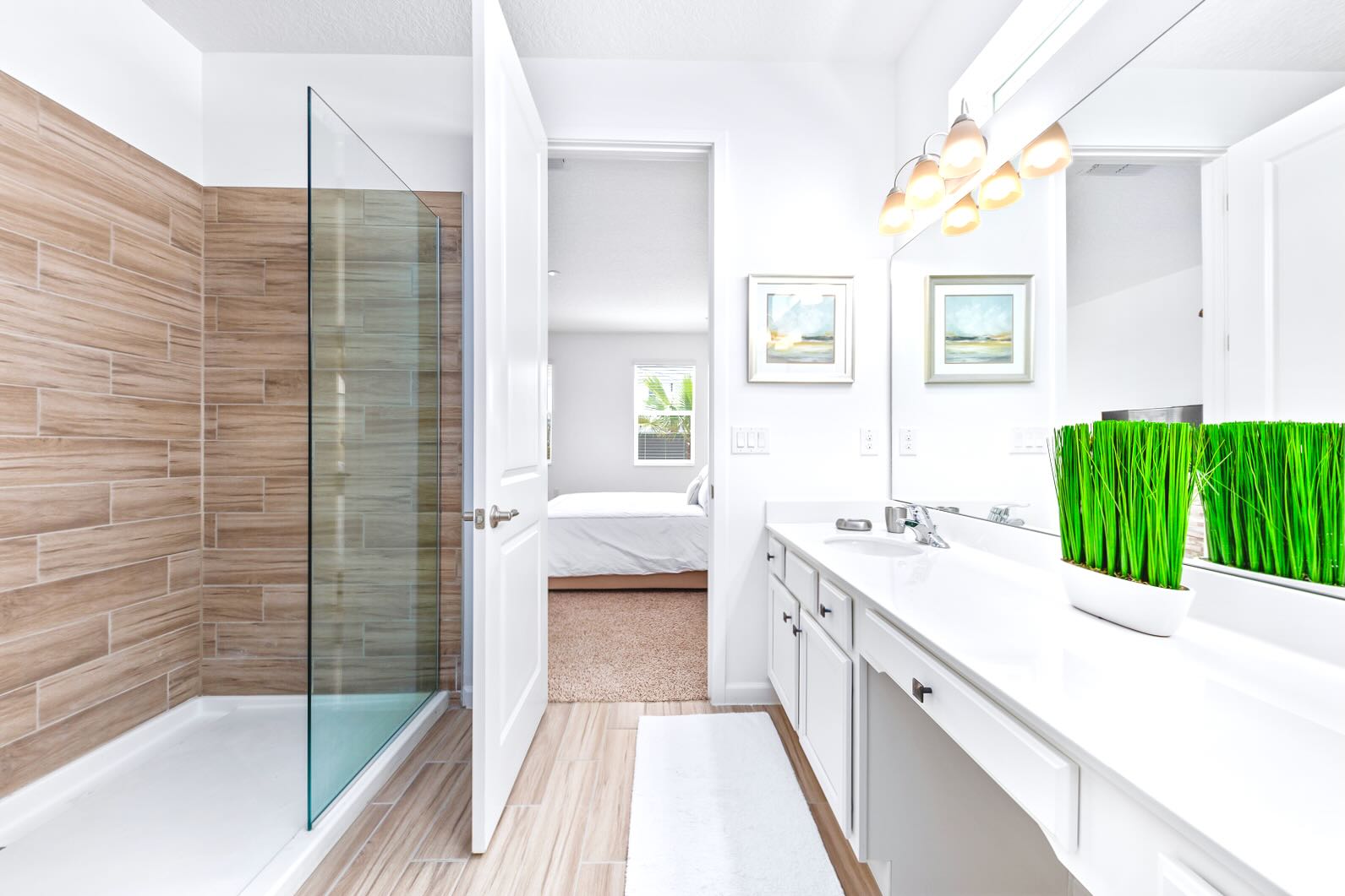 Luxurious Master Bathroom Featuring Double Vanity And Walk-In Shower