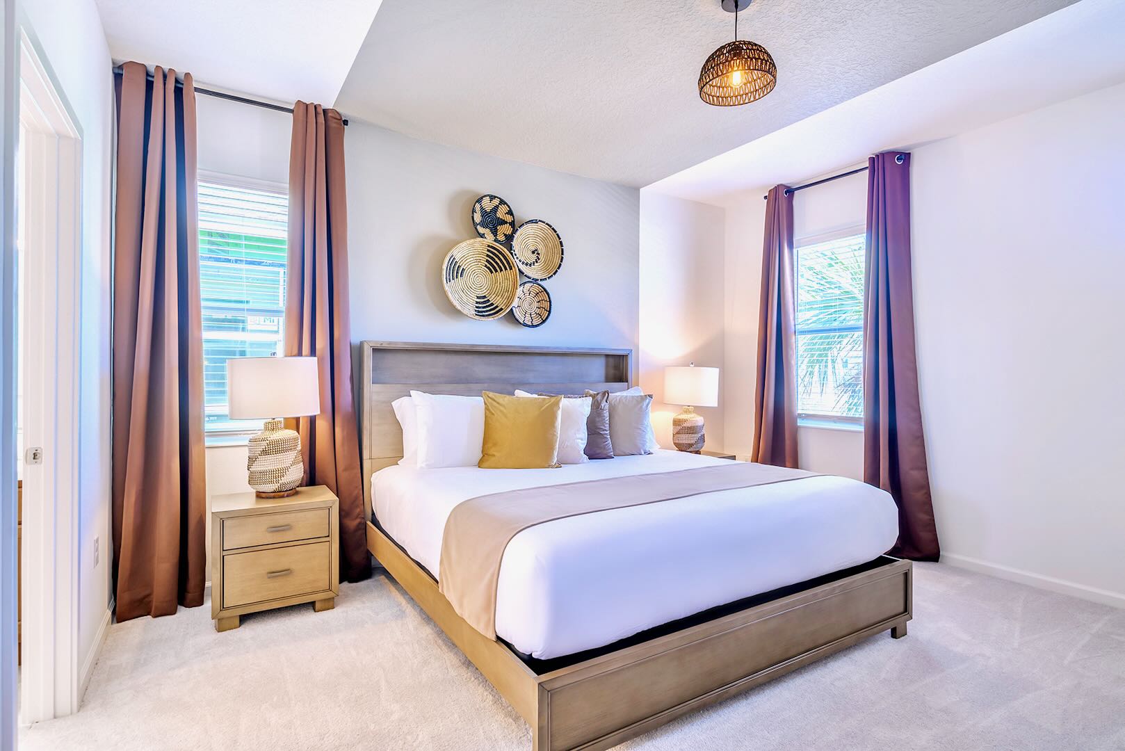 Elegant Queen Suite Featuring A Stylish Bed, Neutral Palette, And Modern Décor