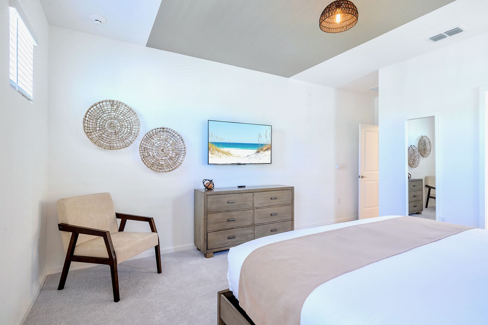 Relaxing Bedroom With Chic Design, Wall Art, And Neutral Colors