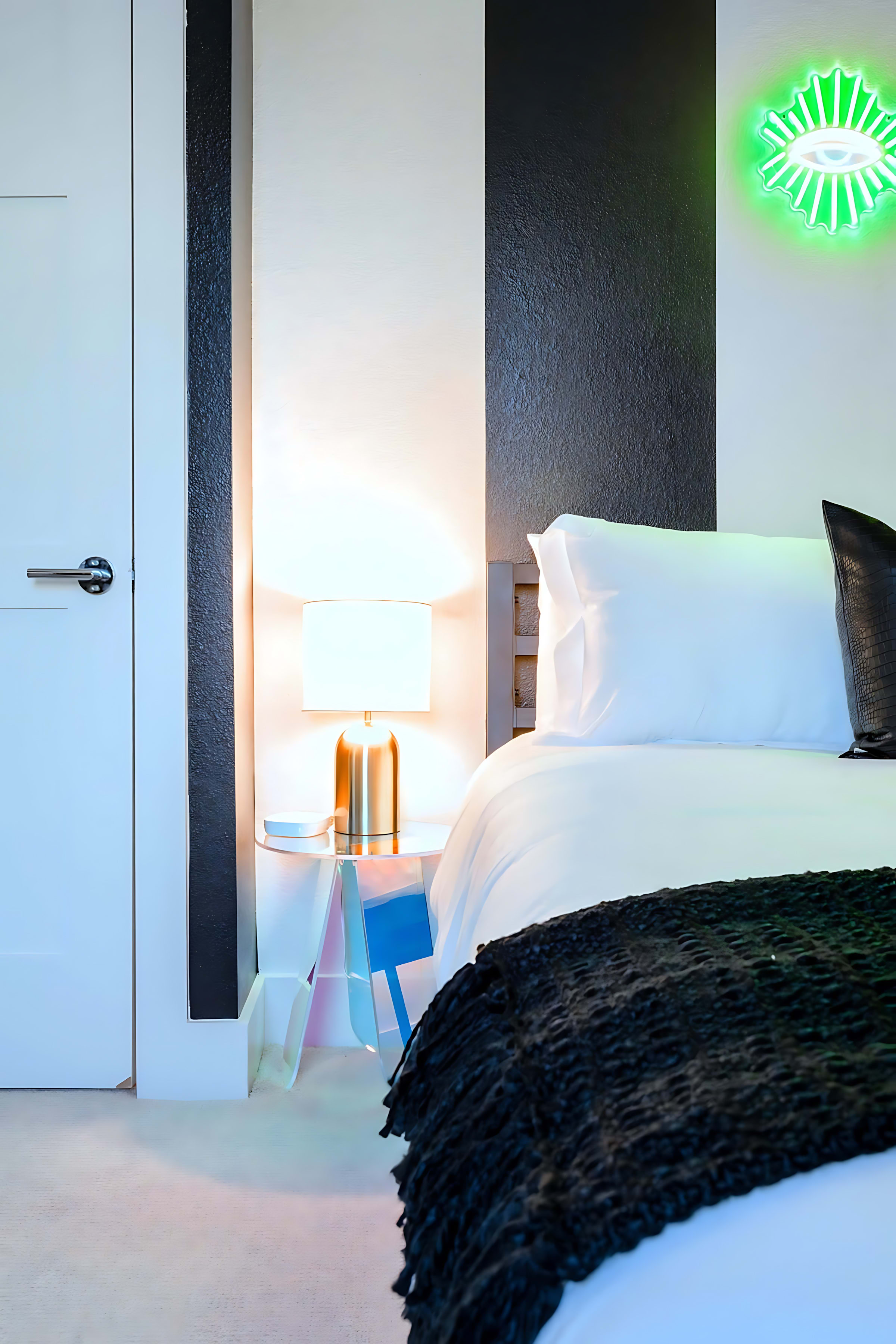 Stylish bedroom with queen bed