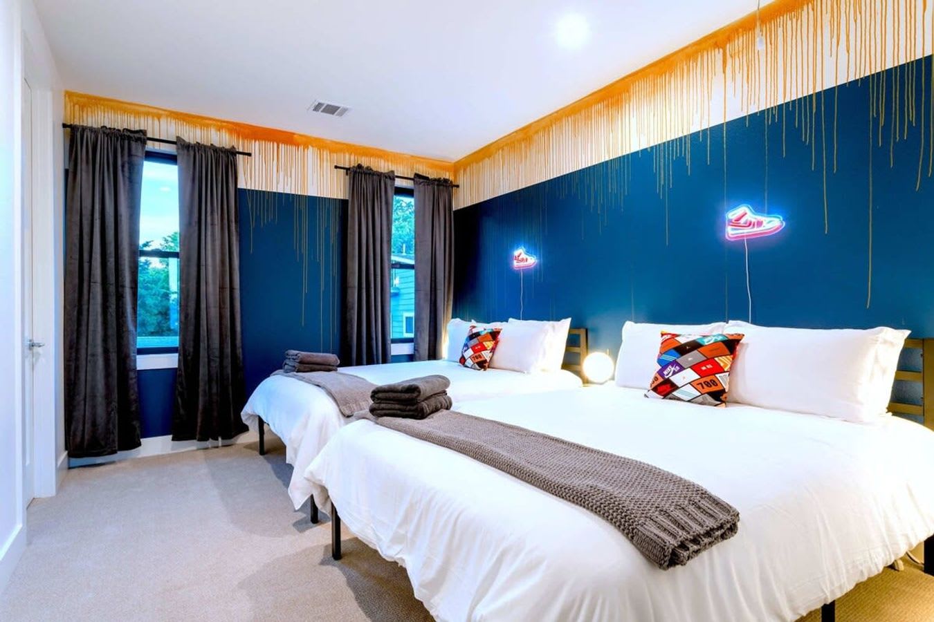 Two queen beds with natural light