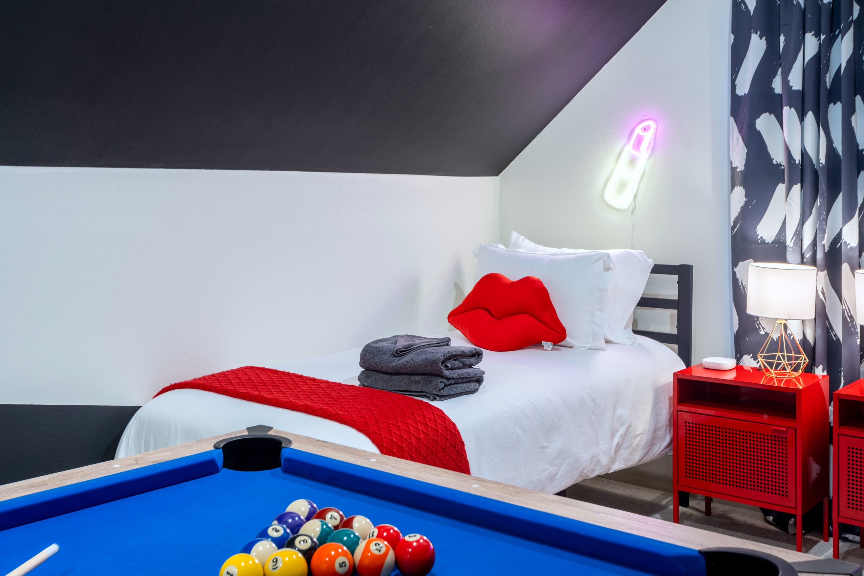 Single bed in game room