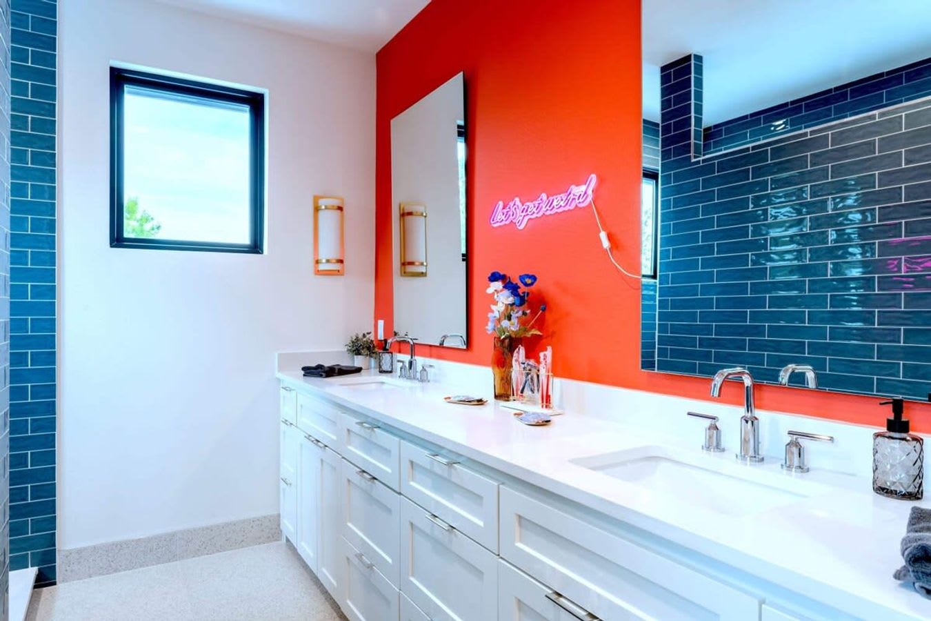 Spacious bathroom with double sinks and natural light