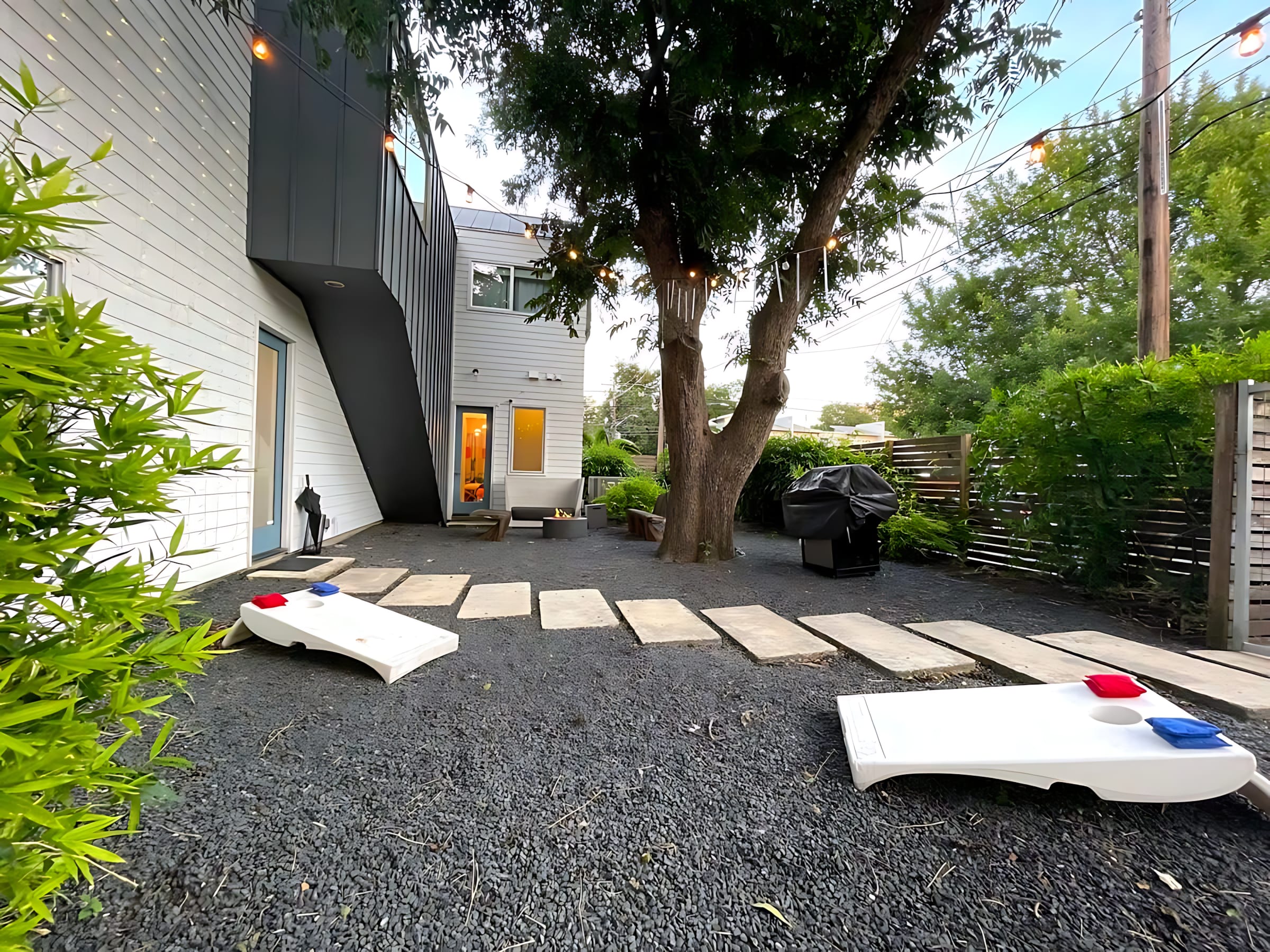 Spacious Backyard With Grill And Outdoor Games