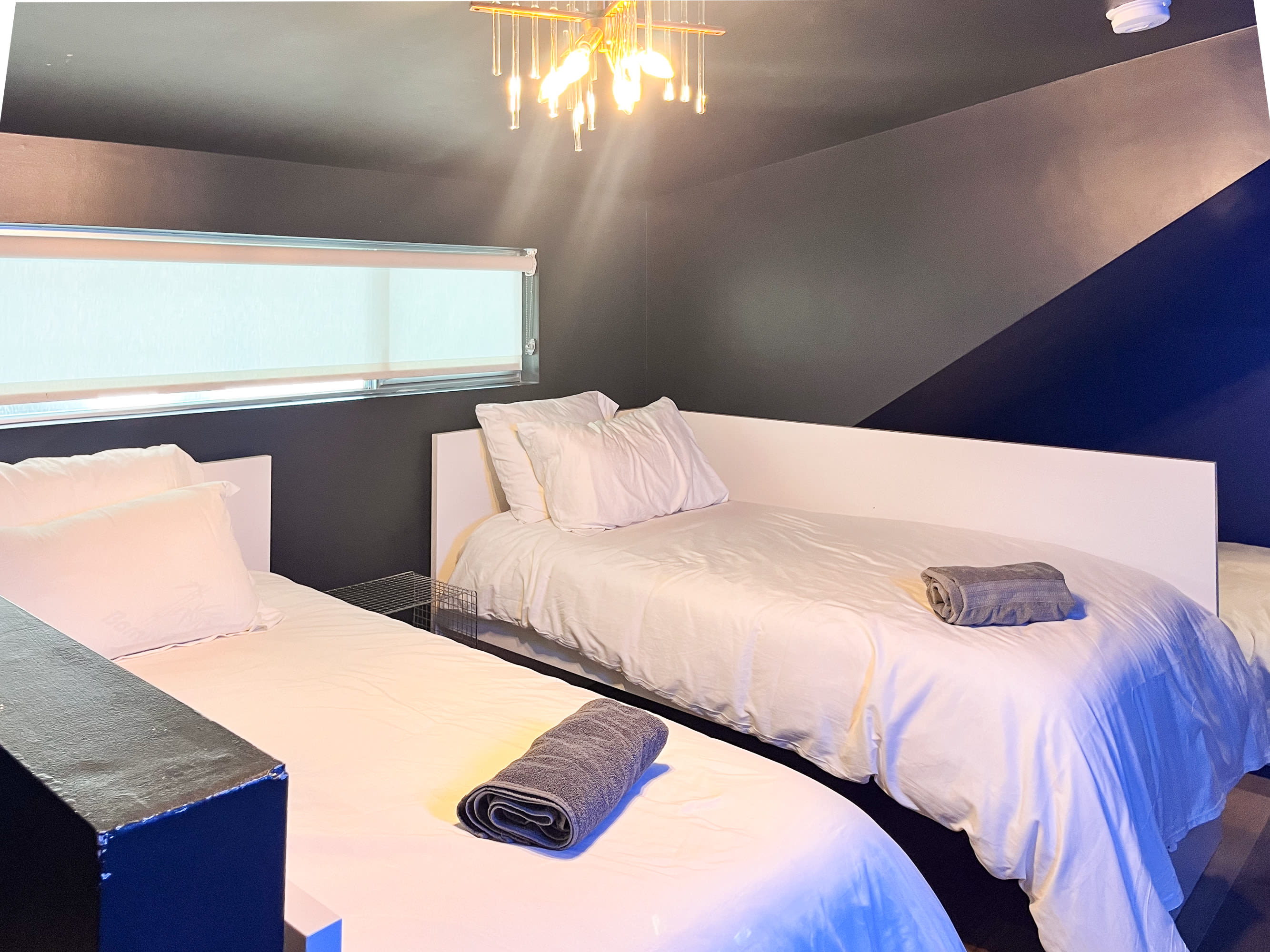 Modern Bedroom With Two Twin Beds And Minimalist Decor