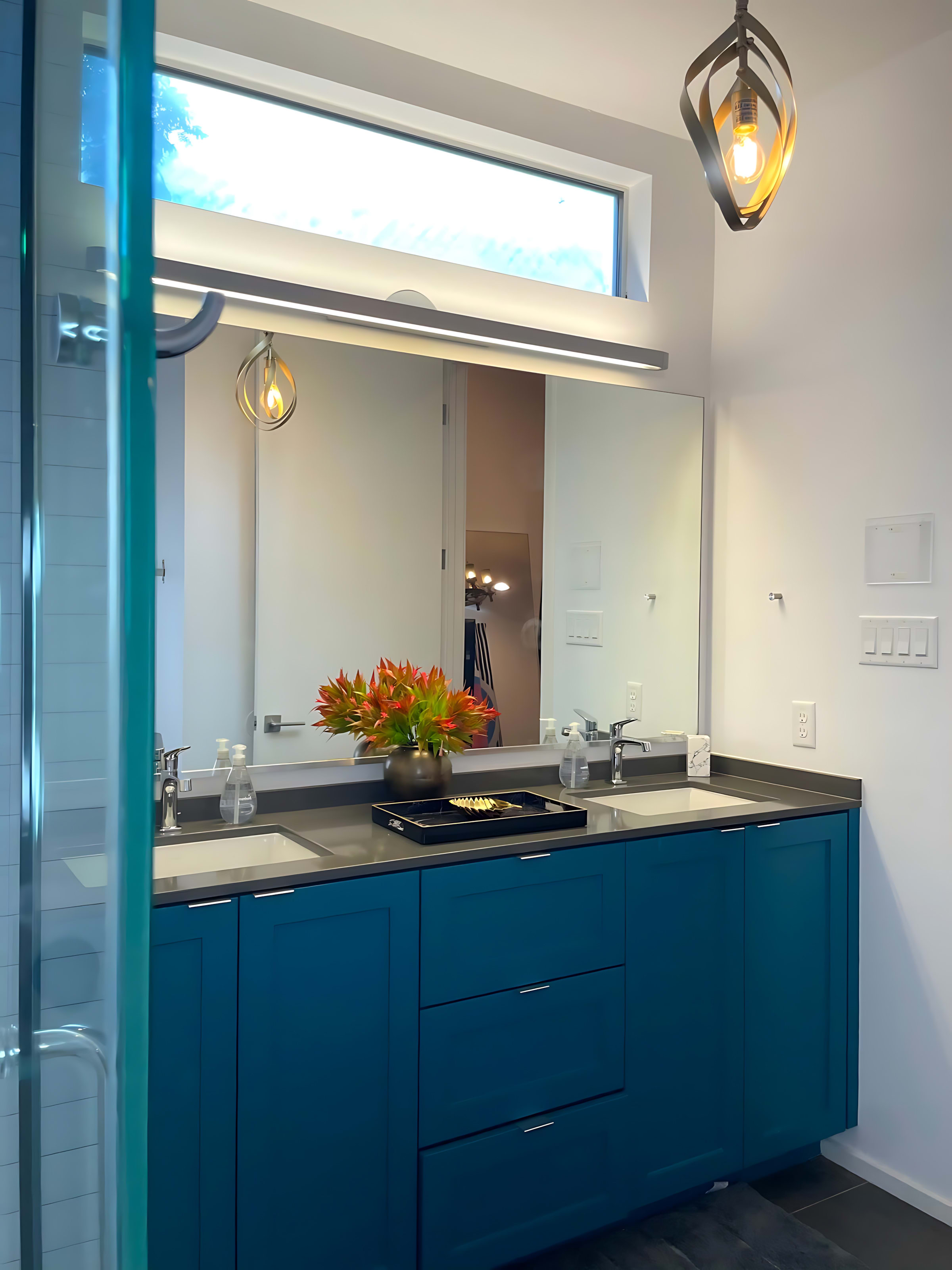 Elegant Bathroom With A Walk-In Shower, Freestanding Tub, And Double Vanity