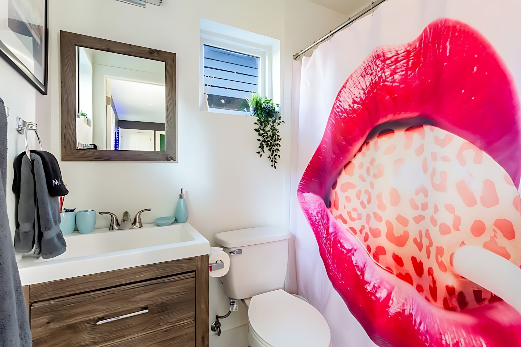 Cozy Bathroom With Playful Decor And Natural Light