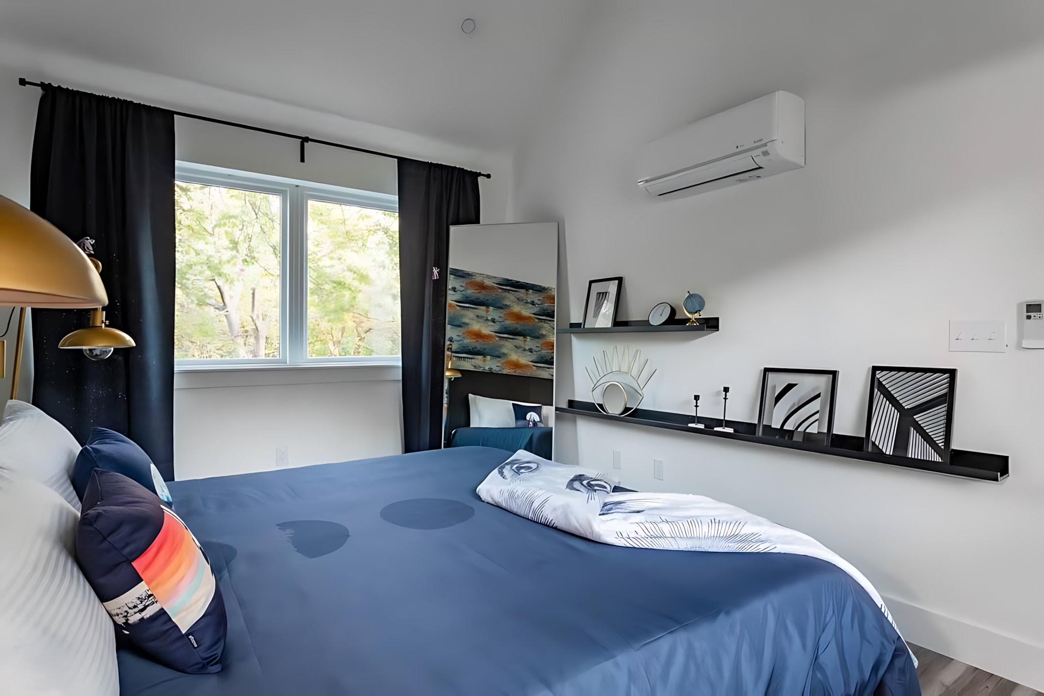 Spacious En-Suite Bedroom With King Bed And Stylish Decor.