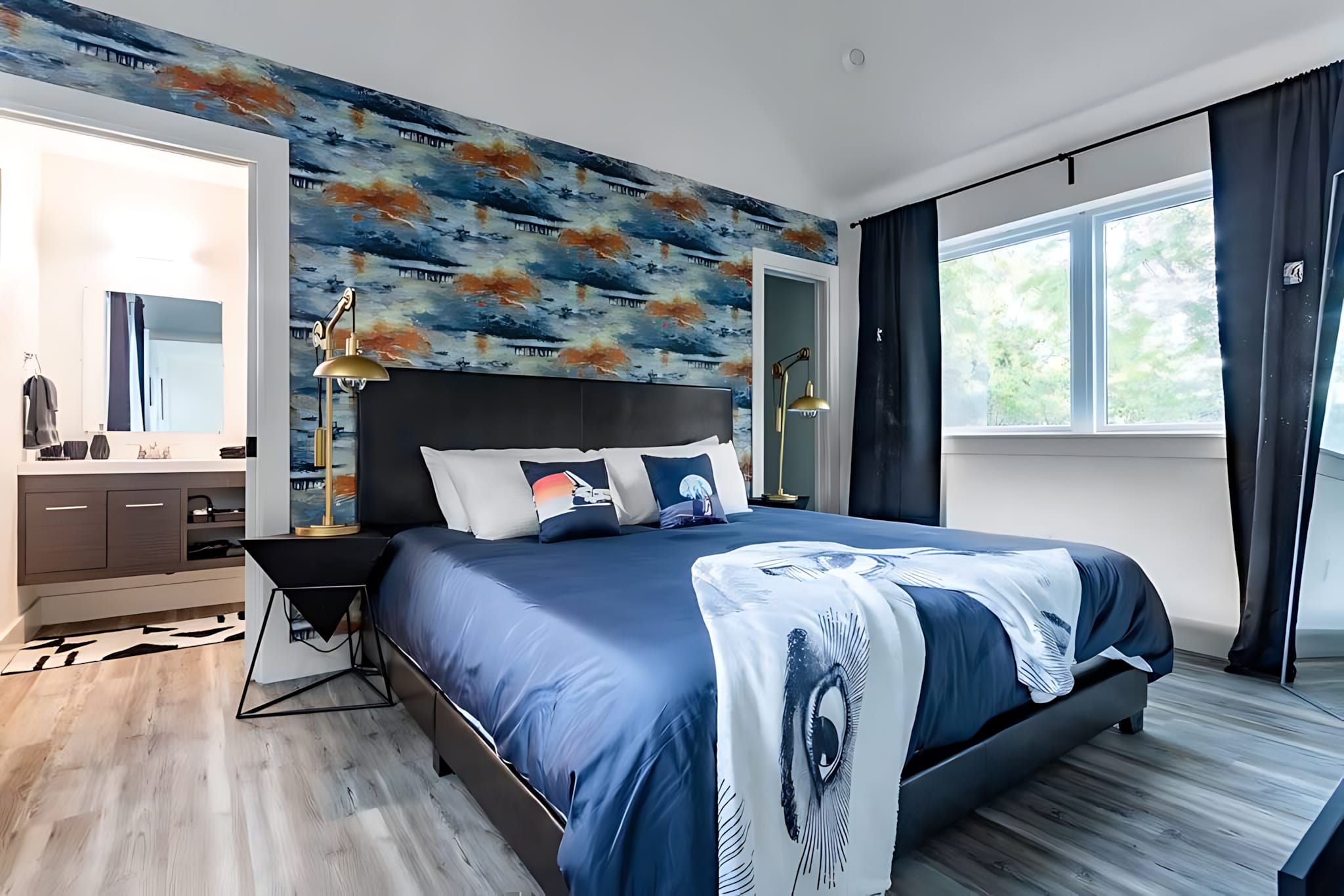 Spacious En-Suite Bedroom With King Bed And Stylish Decor.