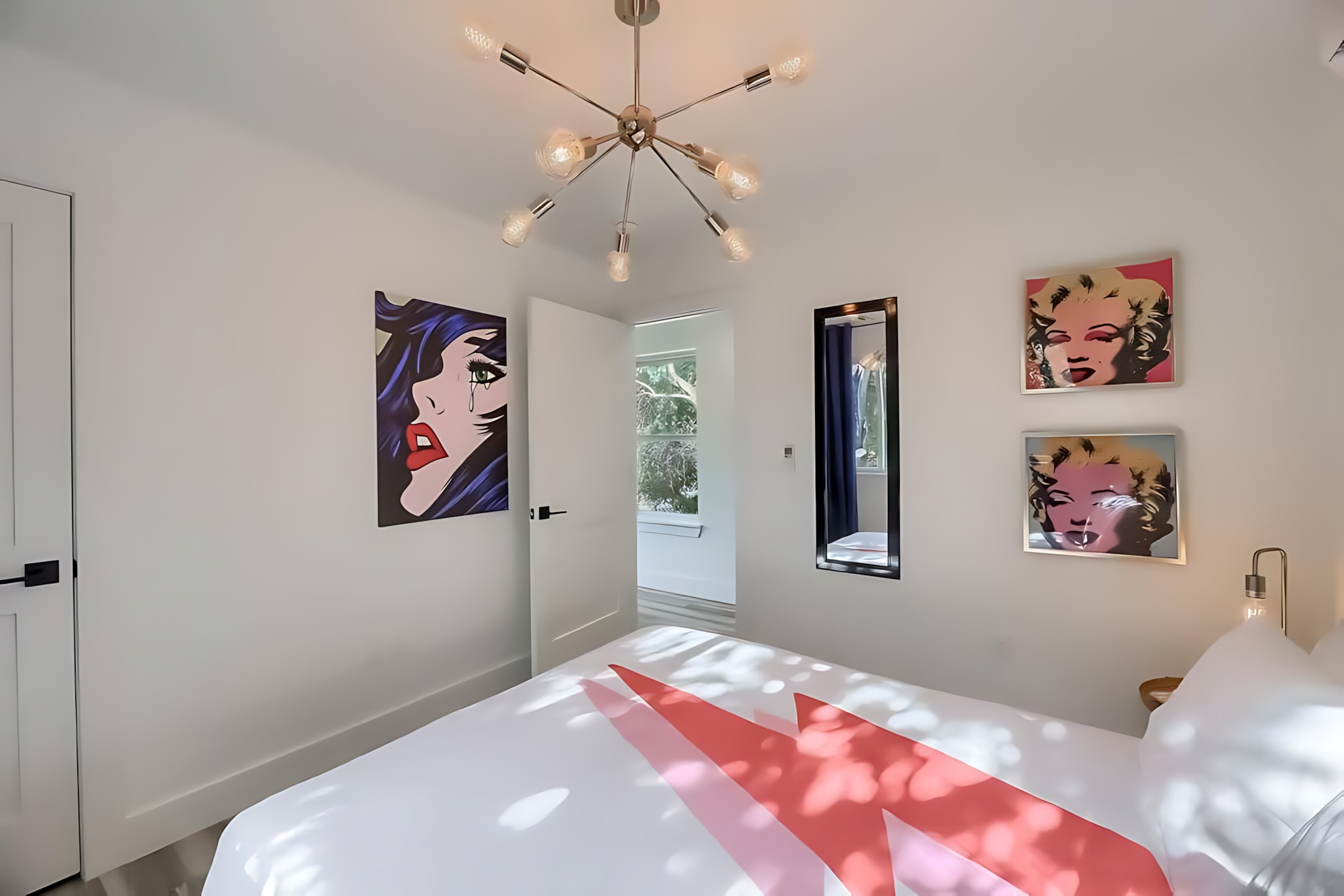 Cozy Bedroom With Queen Bed And Modern Pop Art Decor