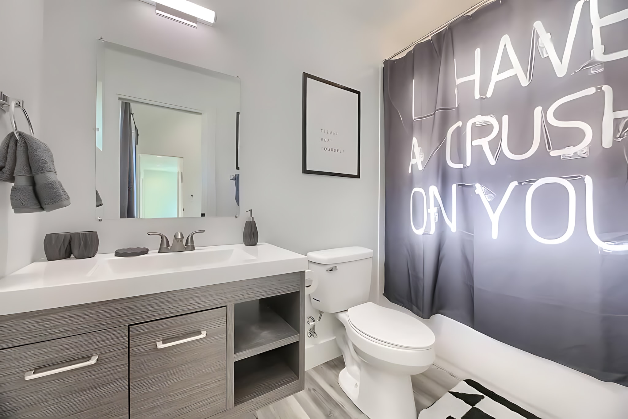 Cozy Bathroom With Playful Decor And Natural Light