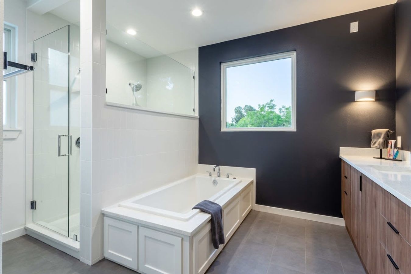 Spacious Bathroom With Walk-In Shower And Bathtub
