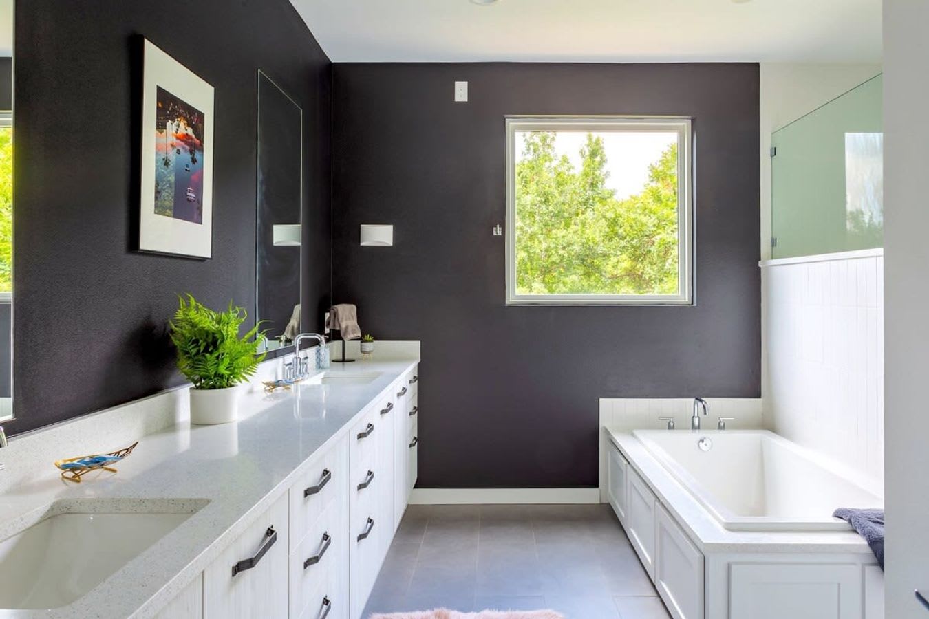Spacious Bathroom with Double Sink and Soaking Tub