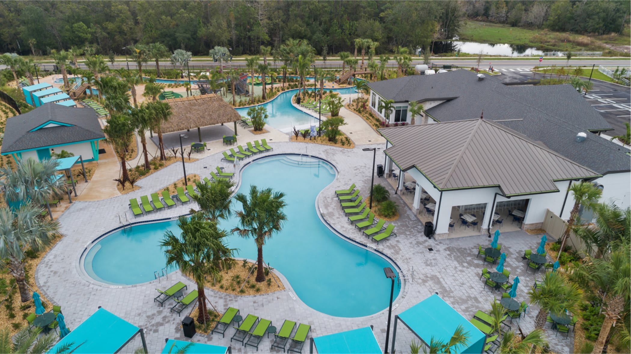 Each clubhouse has a lazy river, a fitness center, and a tiki bar.