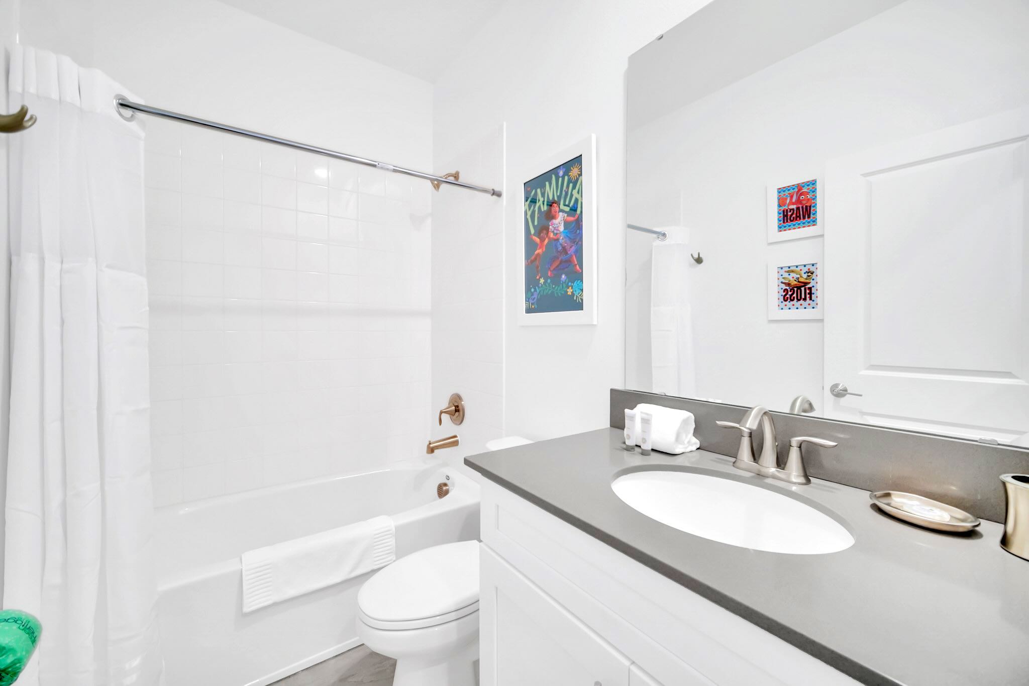 Bright Bathroom With Sleek Fixtures And A Relaxing Bathtub