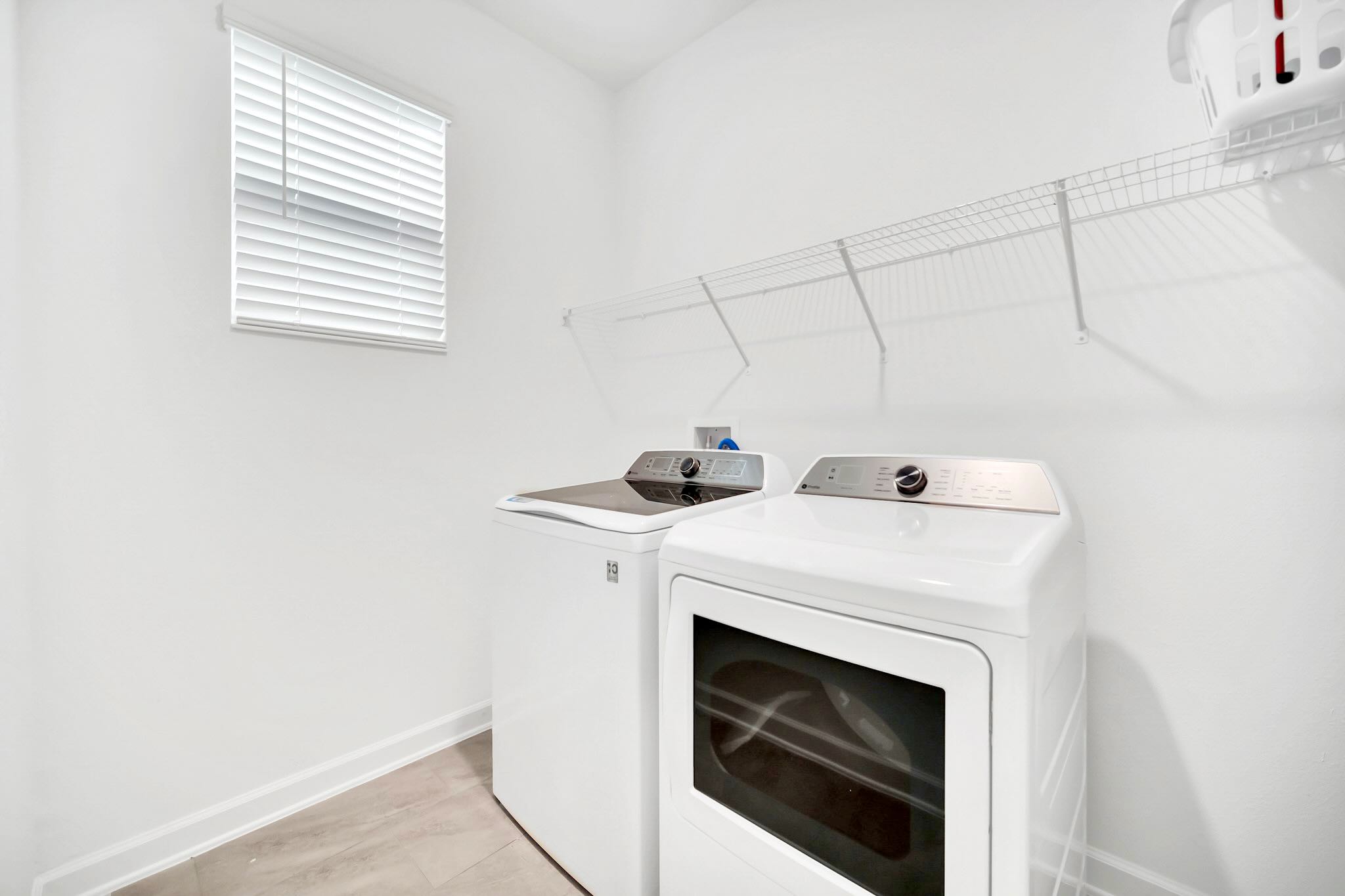 Convenient In-Home Laundry Room With Modern Appliances