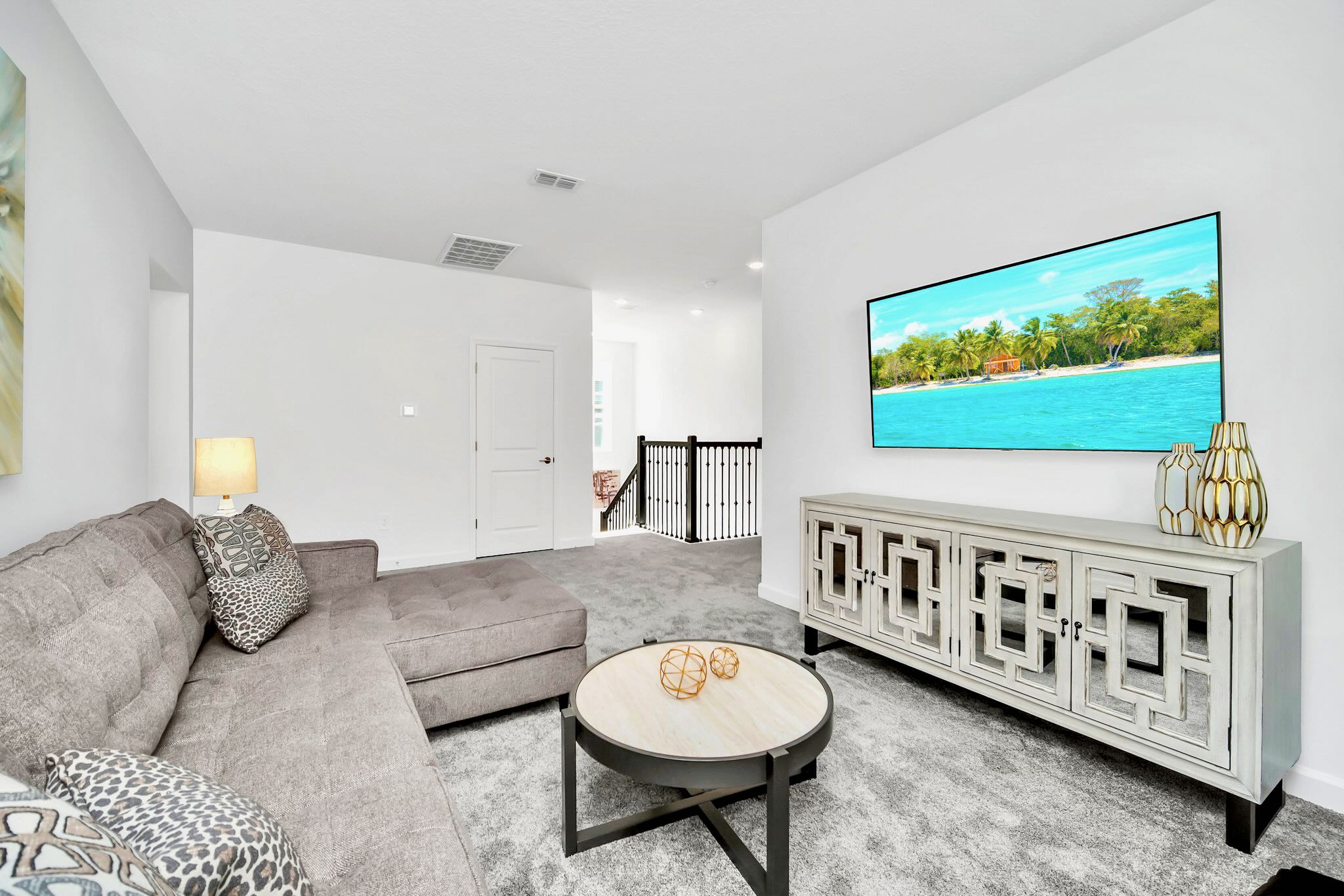 Enjoy Movie Nights In This Bright Space With A Large Smart TV