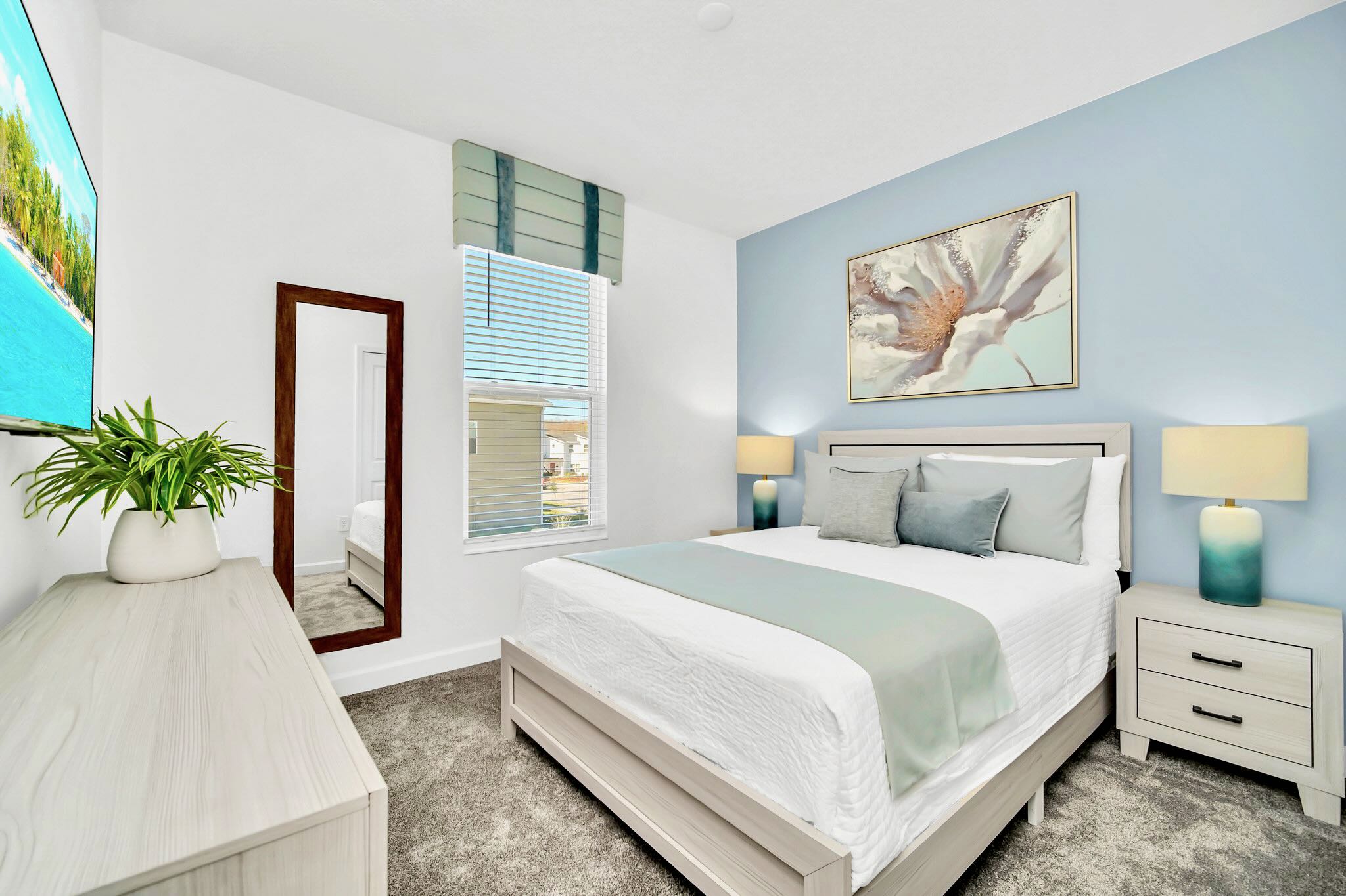 Relax In This Bright Bedroom With Modern Blue Accents