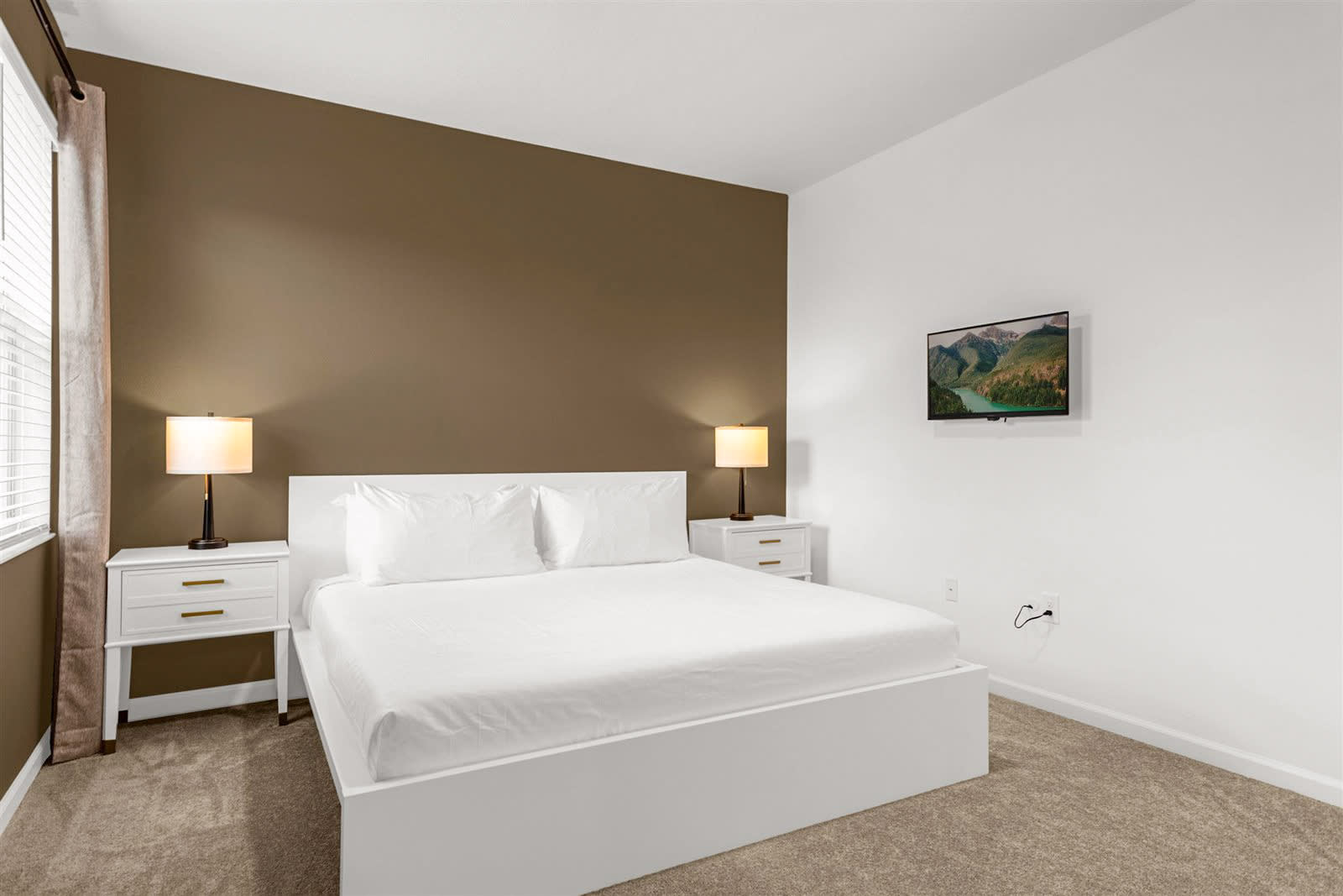 Spacious King Bedroom With Smart TV And Elegant Decor