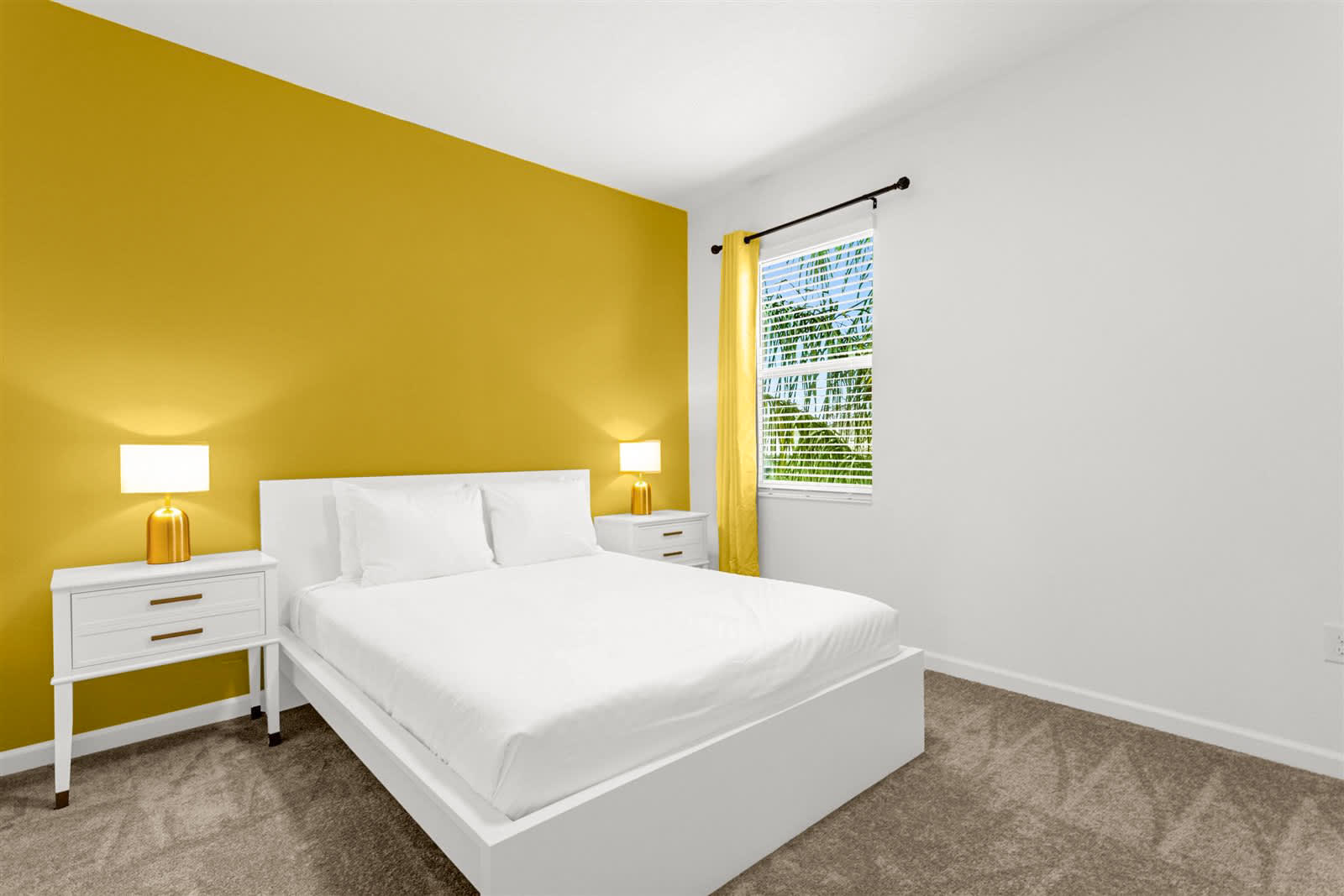 Bright Queen Bedroom With A Cheerful Yellow Accent Wall