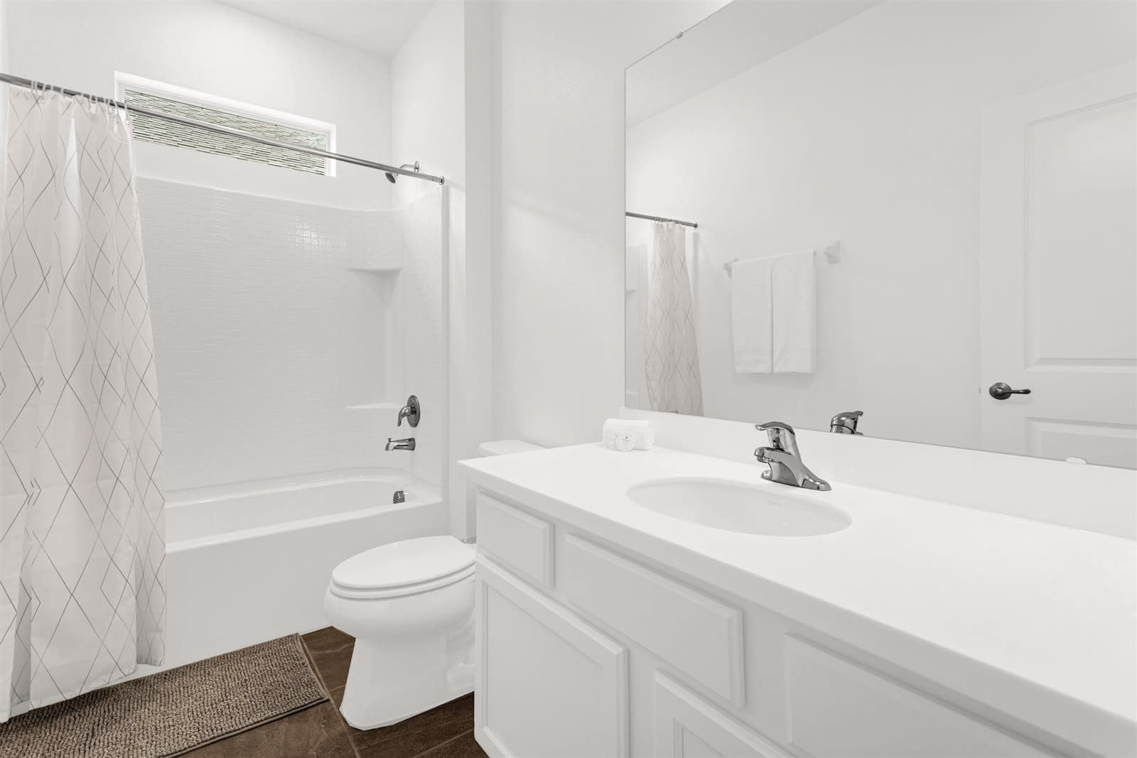 Bright Bathroom With Elegant Details And Ample Lighting