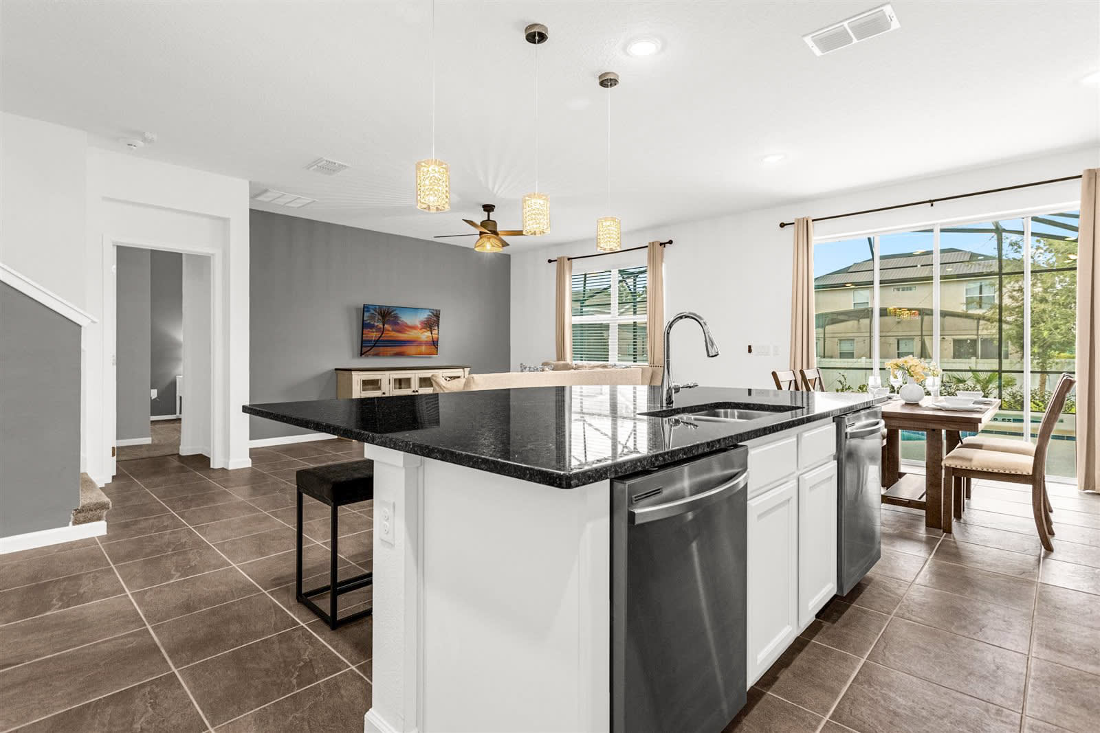 Fully Equipped Chef’s Kitchen With Island Seating For Casual Dining