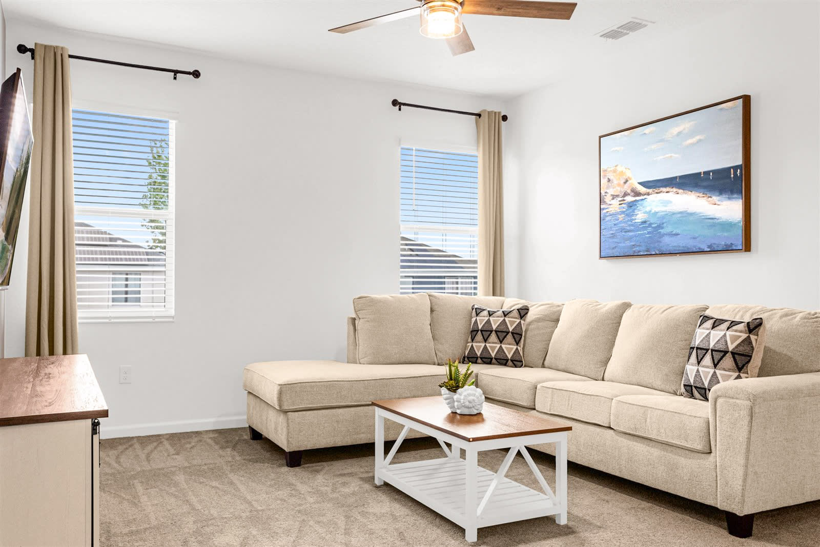 Bright And Airy Living Space With Plush Seating And Warm Natural Light