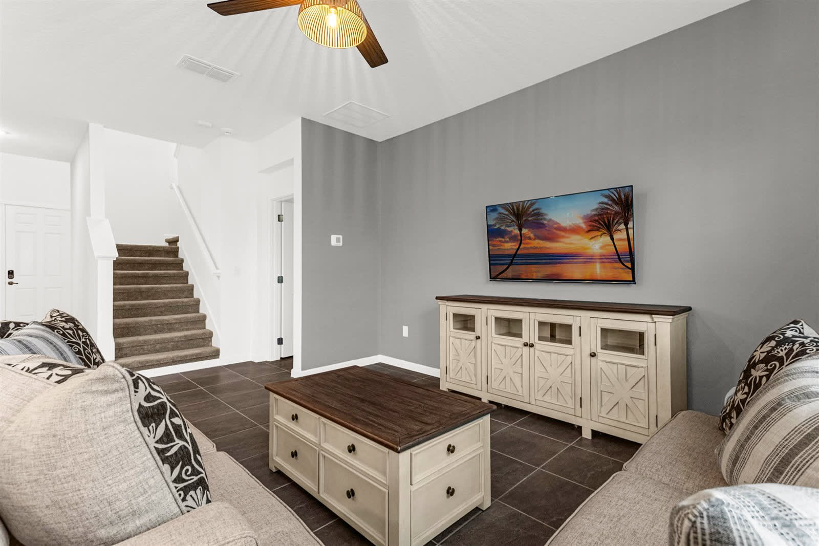 Stylish Living Room With A Wall-Mounted Smart TV And Classic Decor