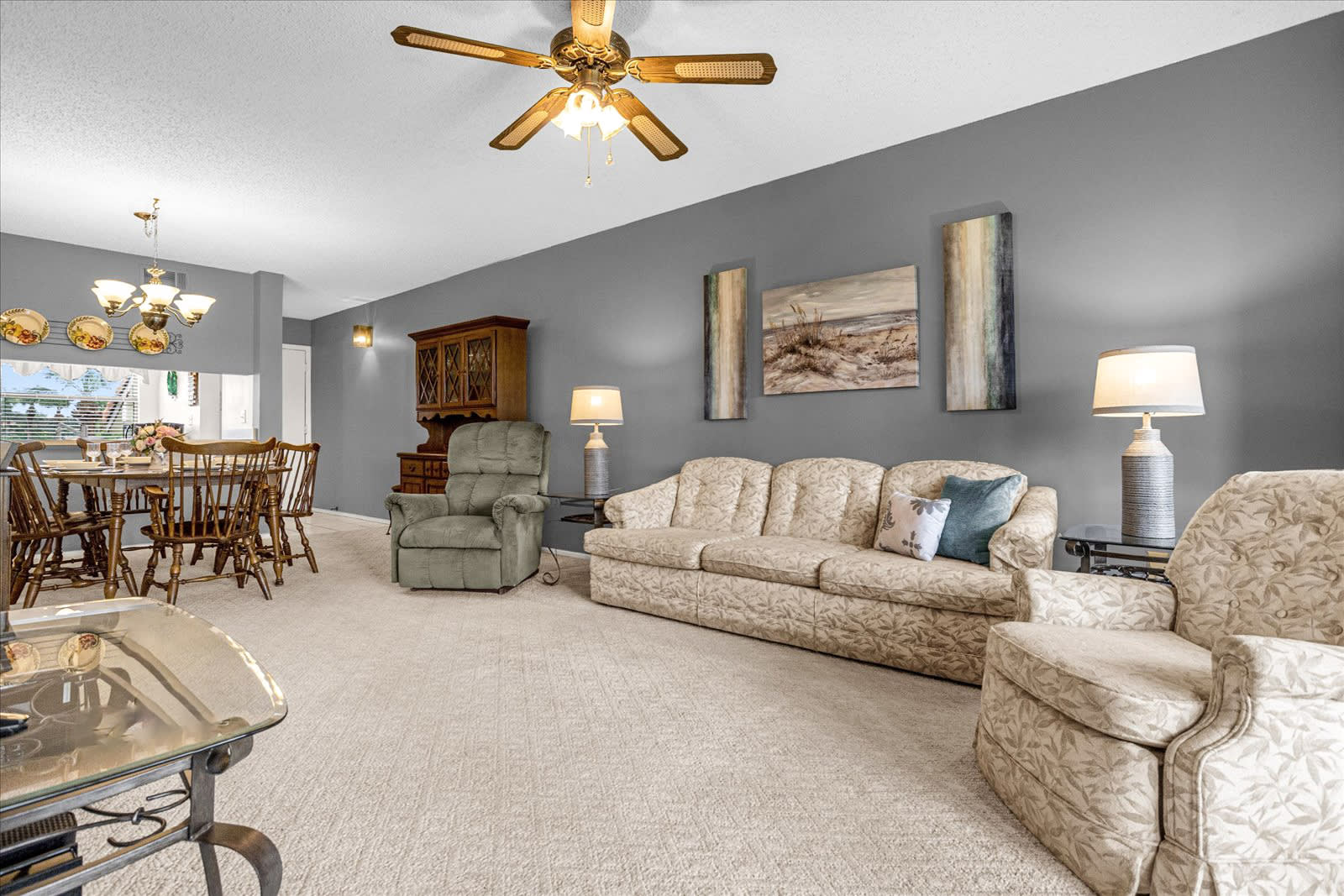 Spacious Living Room With Comfortable Seating And Smart TV