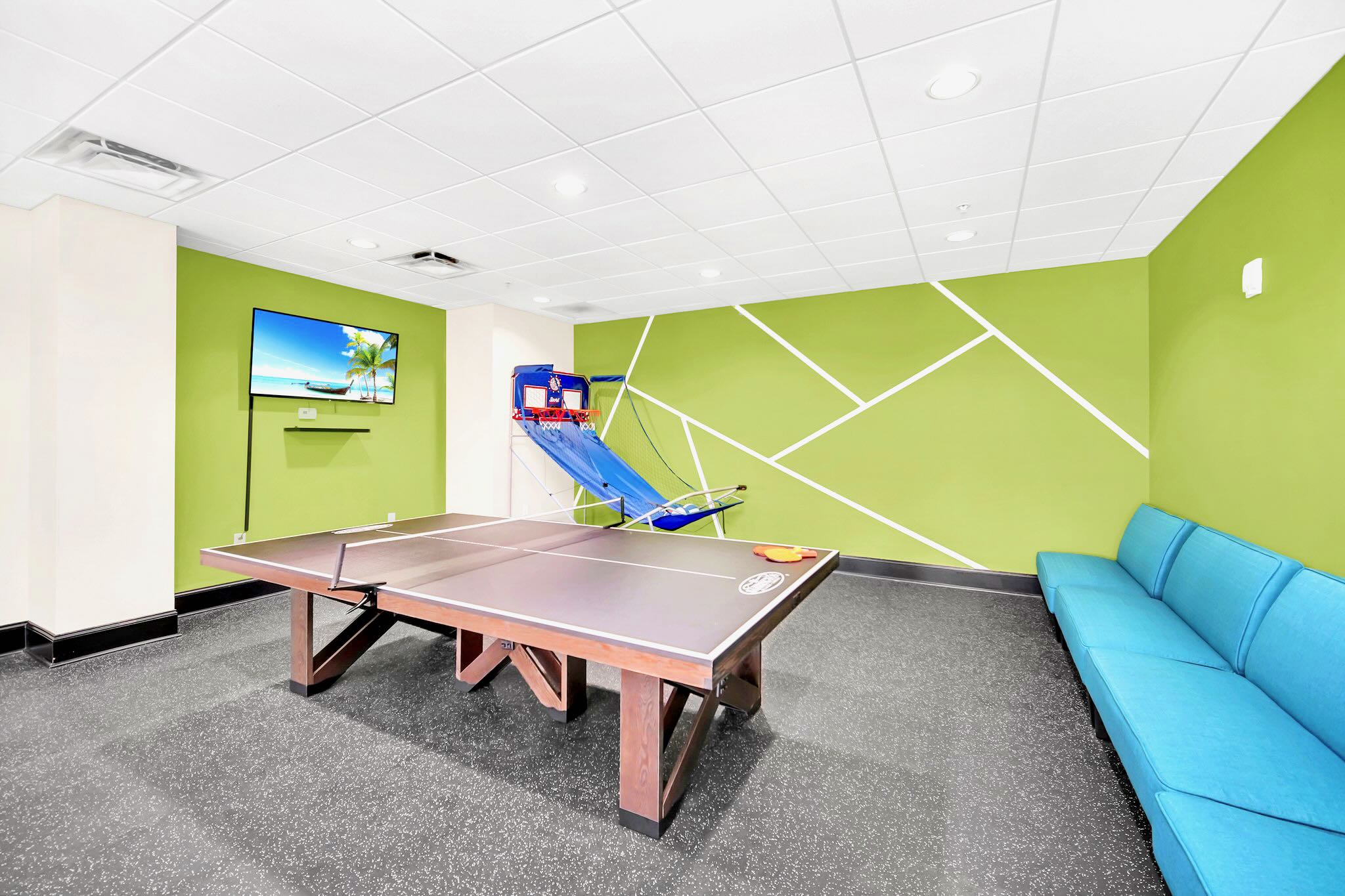 Fun-Filled Game Room Featuring Table Tennis And Mini Basketball Games