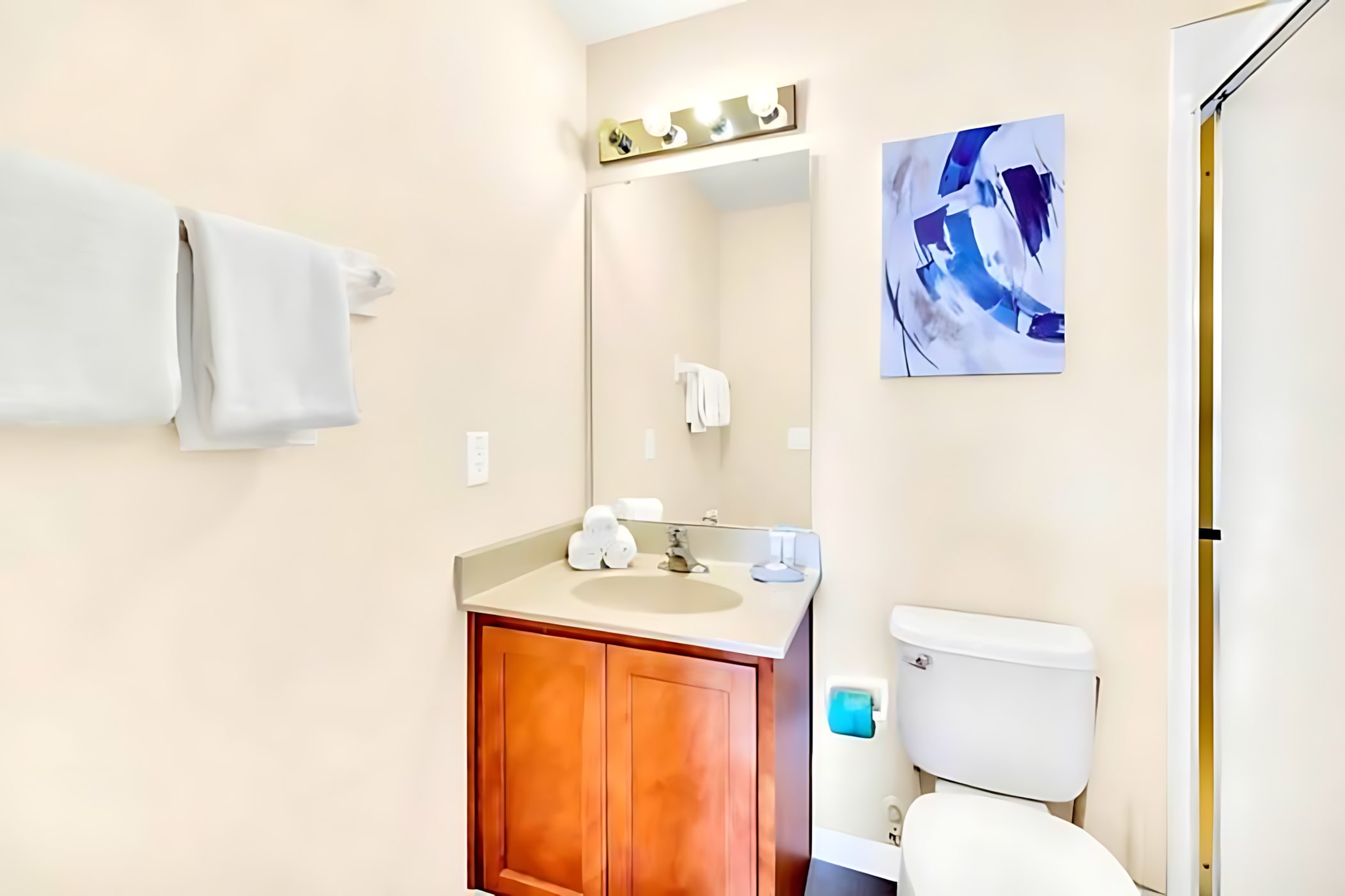 Powder Room With Clean Lines And Bright Lighting