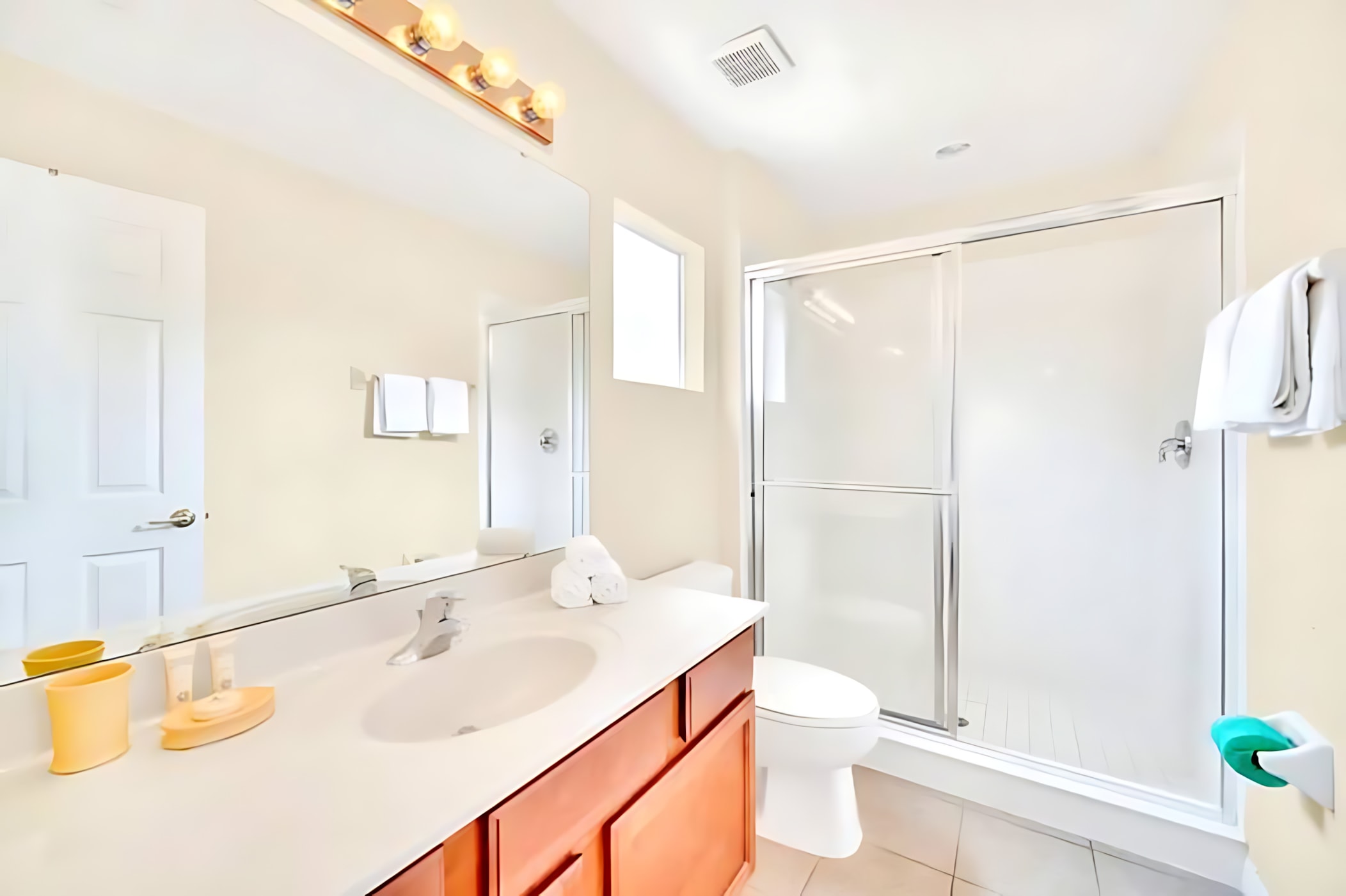 Bathroom Featuring Modern Fixtures And Spacious Walk-In Shower