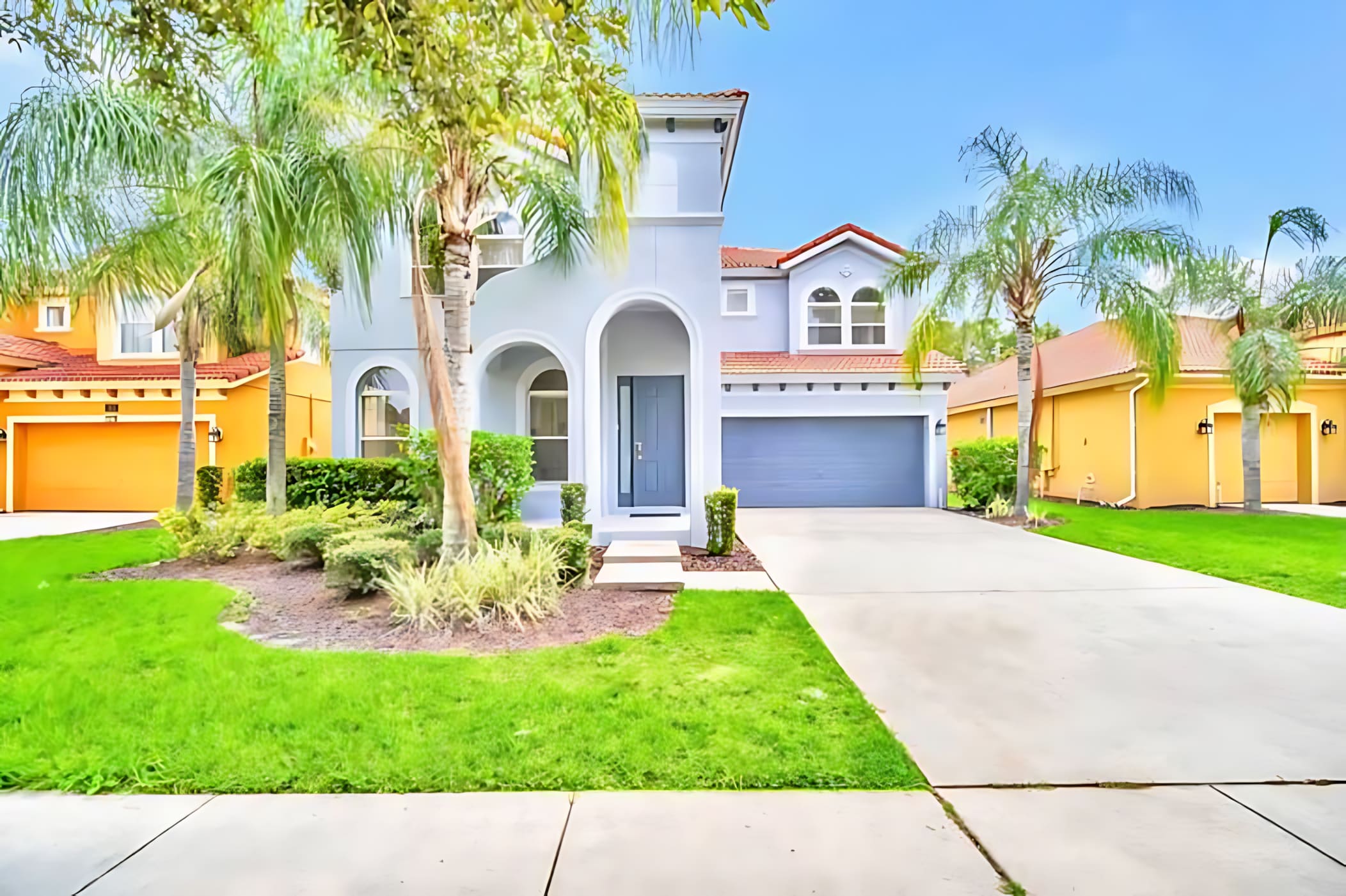 Stunning Exterior With Manicured Lawn And Ample Parking Space