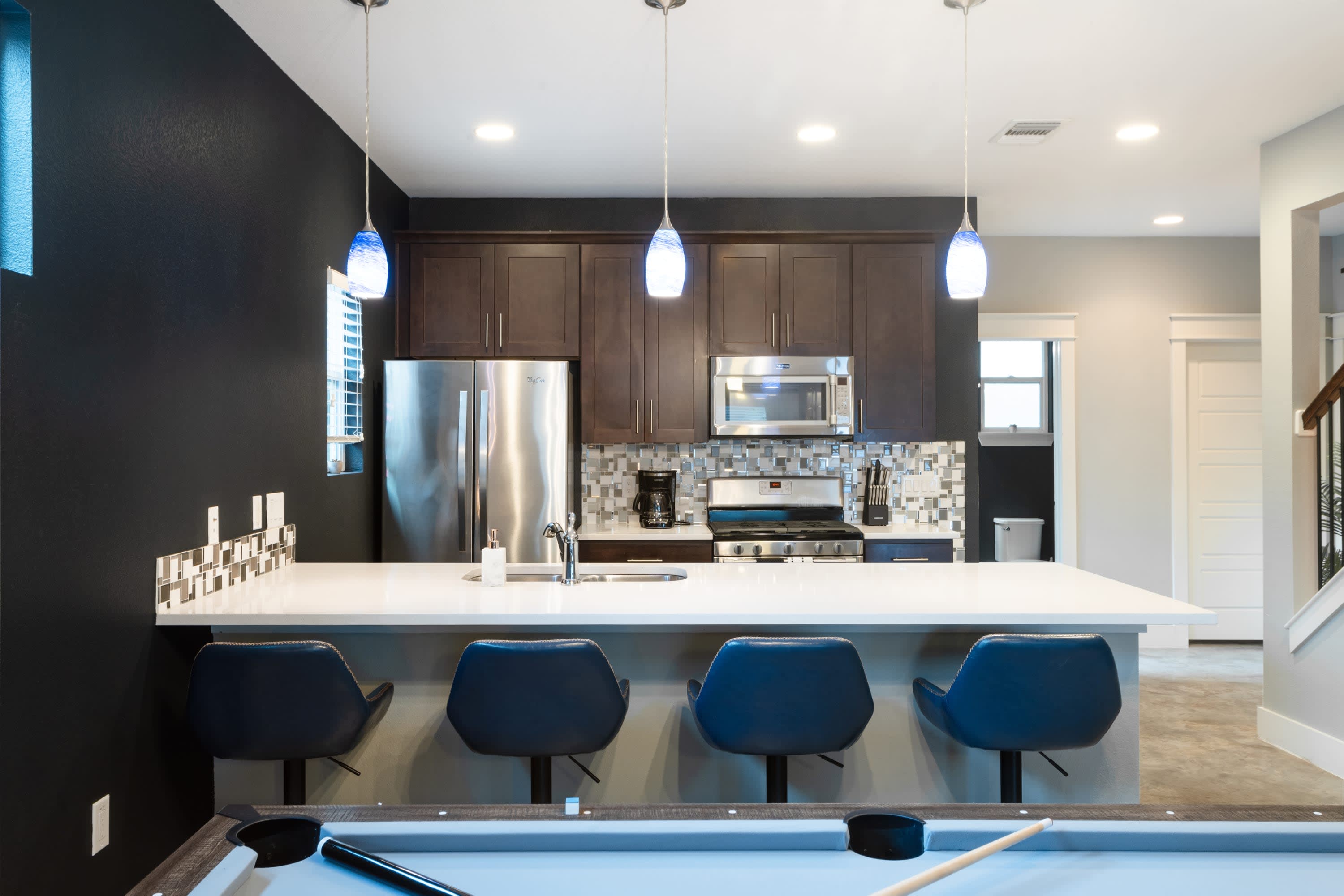 Fully Equipped Kitchen with Bar Seating