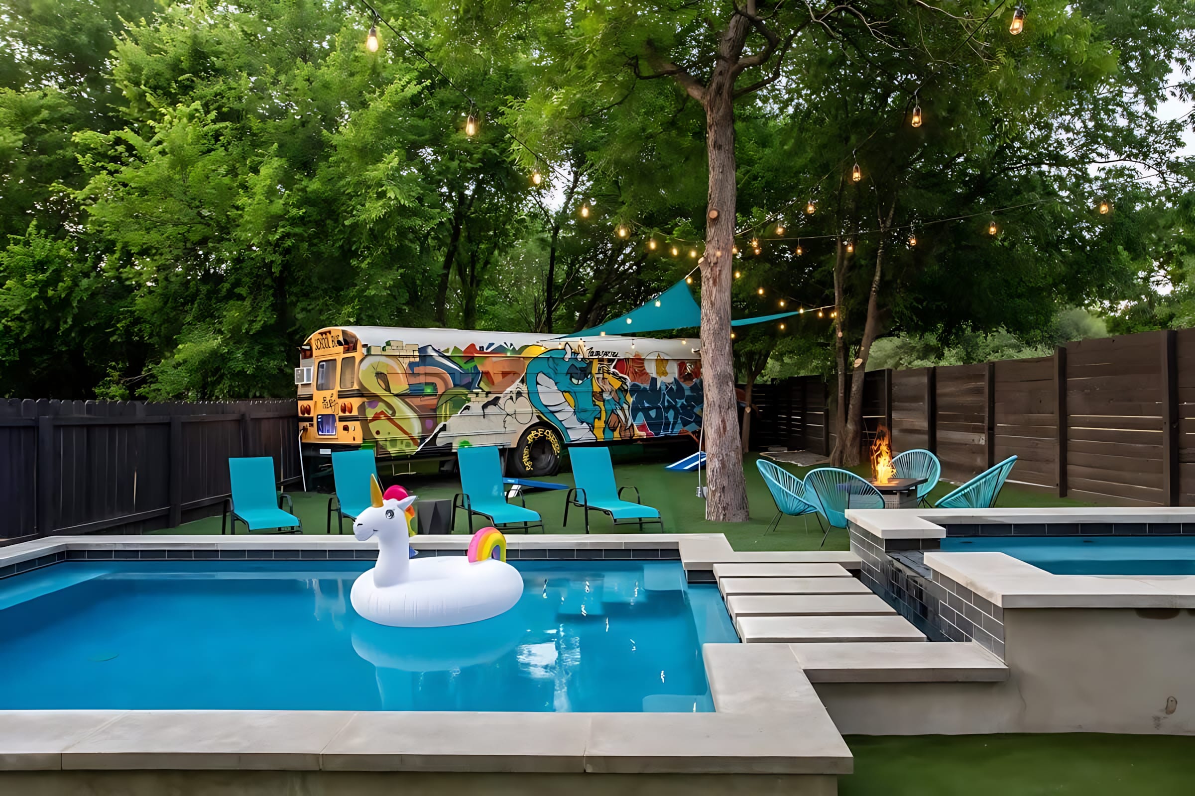 Beautiful Pool And Hot Tub With Lounge Chairs And A Fire Pit For Relaxation