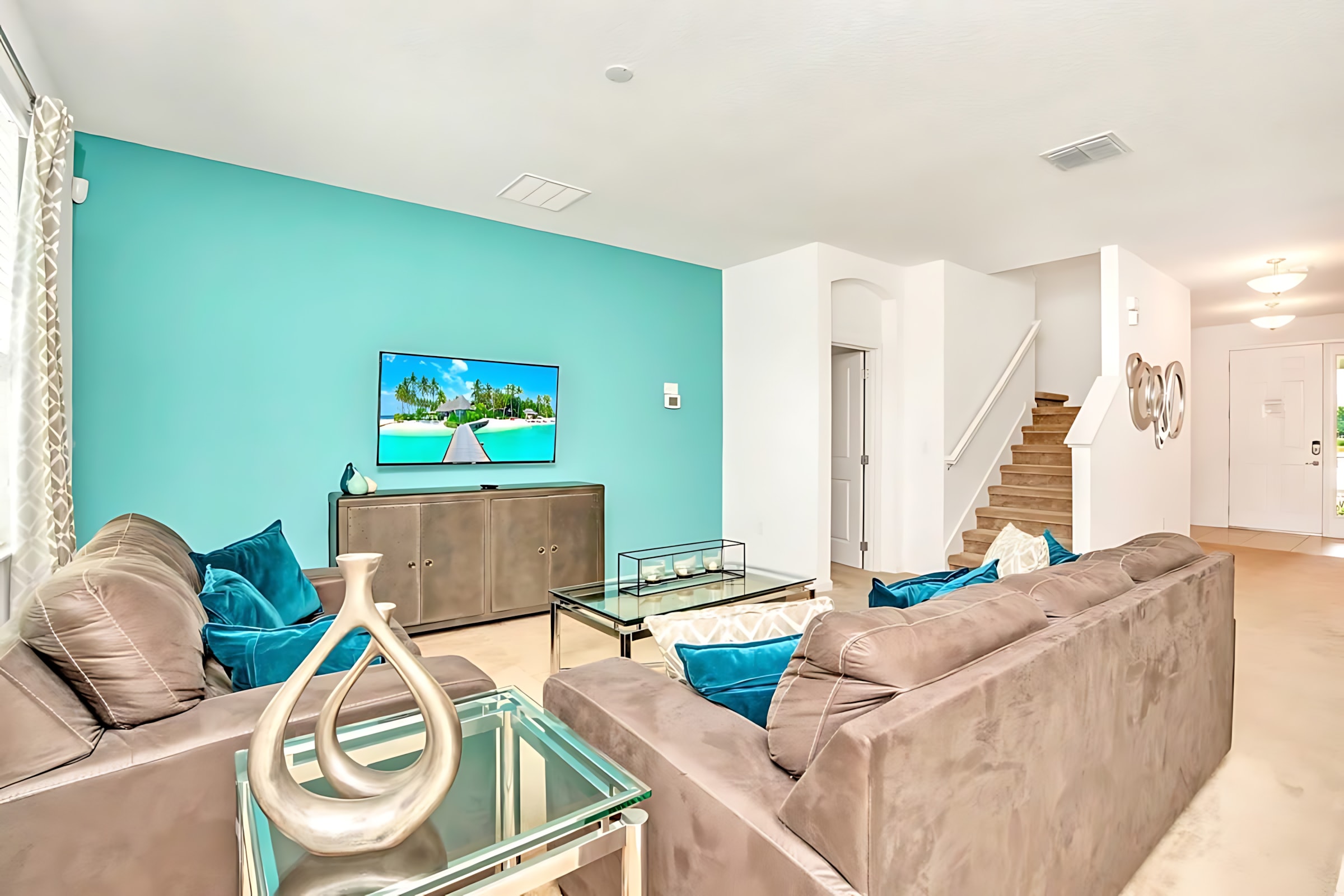 Open-Concept Living Room With Comfortable Seating And Modern Accents