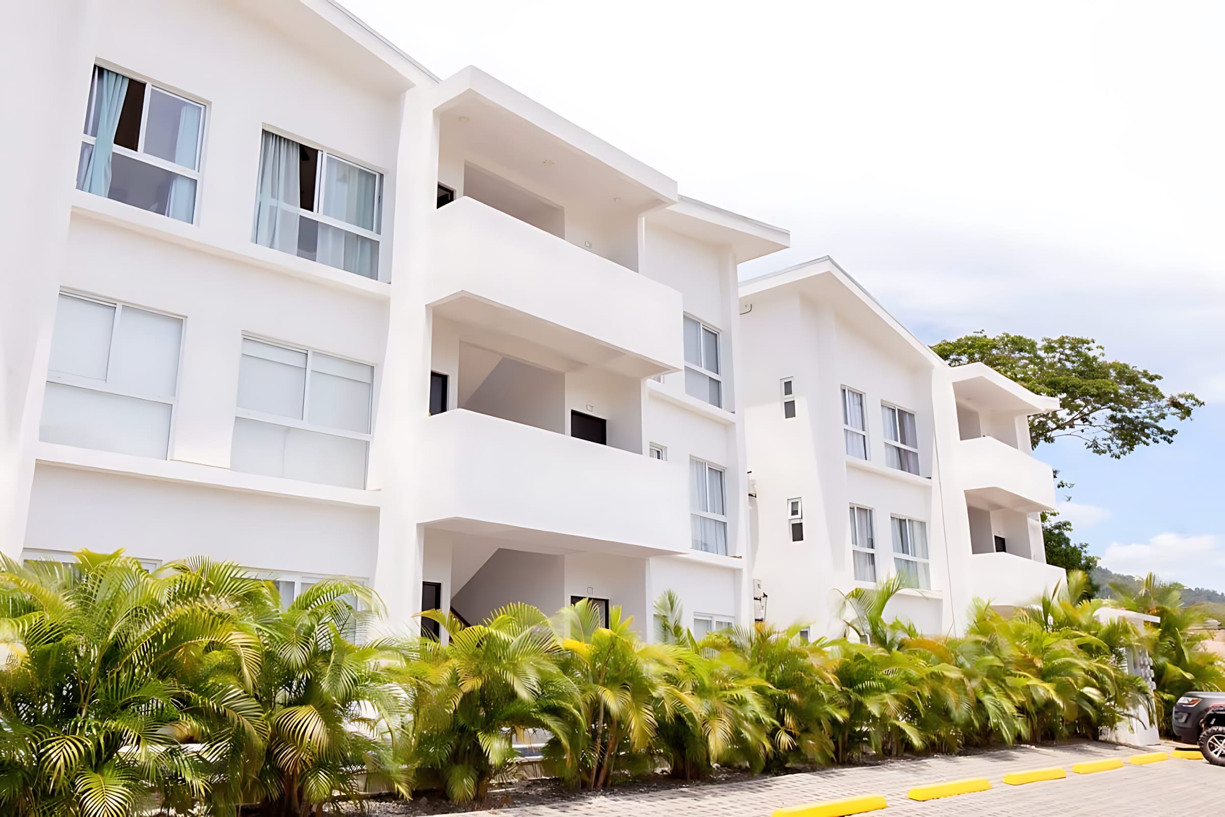Stunning White-Facade Building Offering Modern Living Spaces