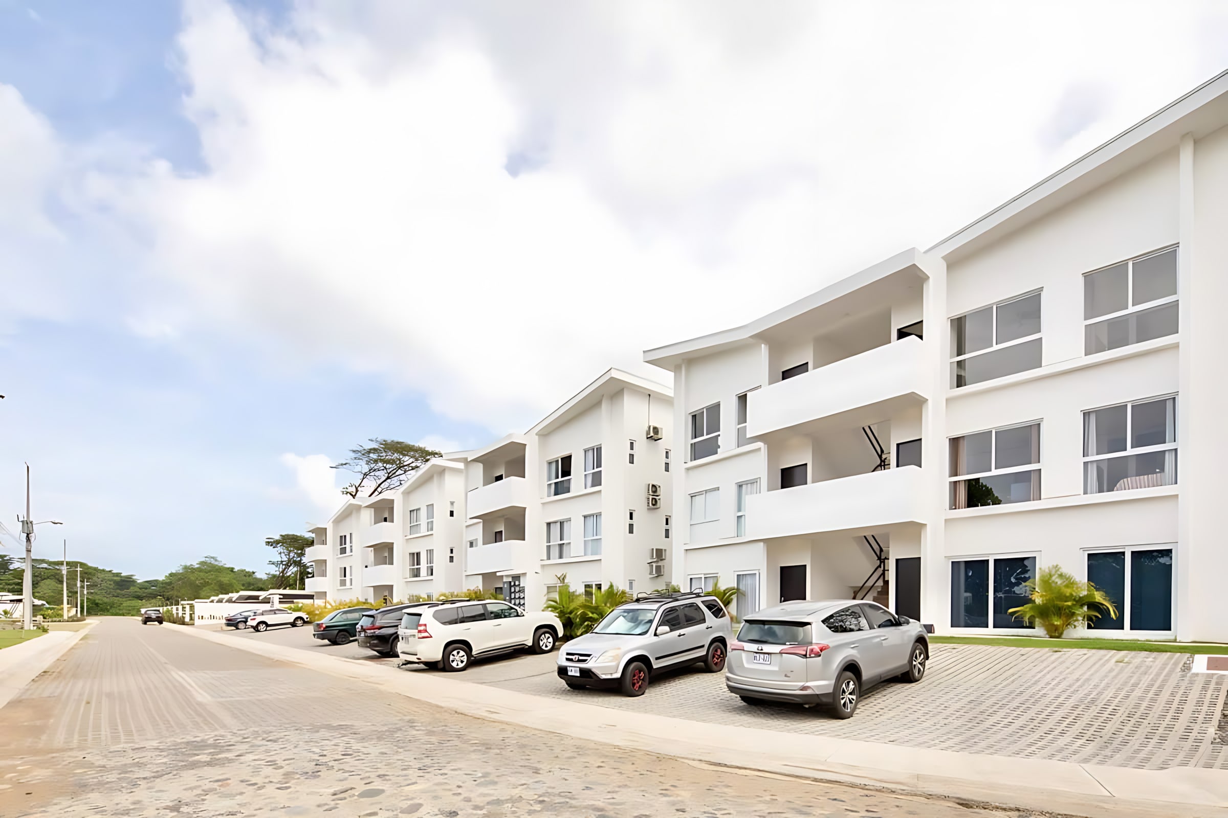 Stunning White-Facade Building Offering Modern Living Spaces