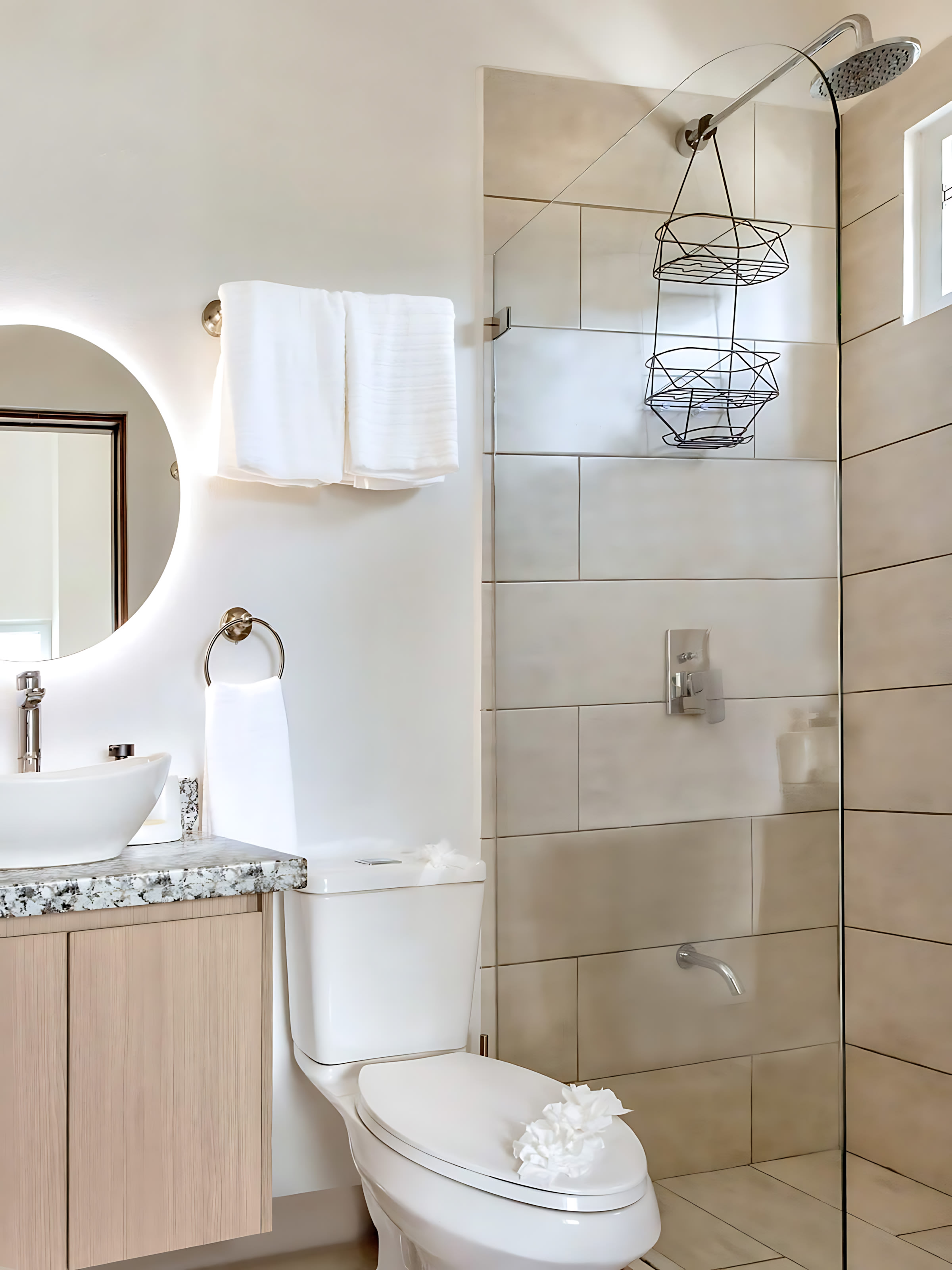 Bright Bathroom With Chic Fixtures And A Spacious Walk-In Shower