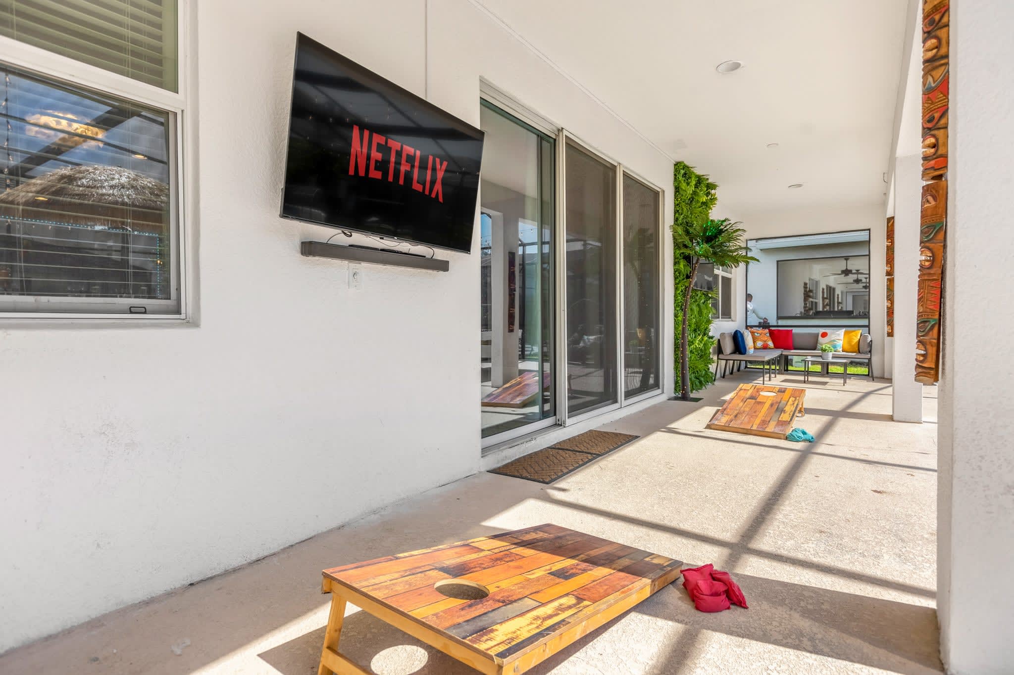 Poolside cornhole game