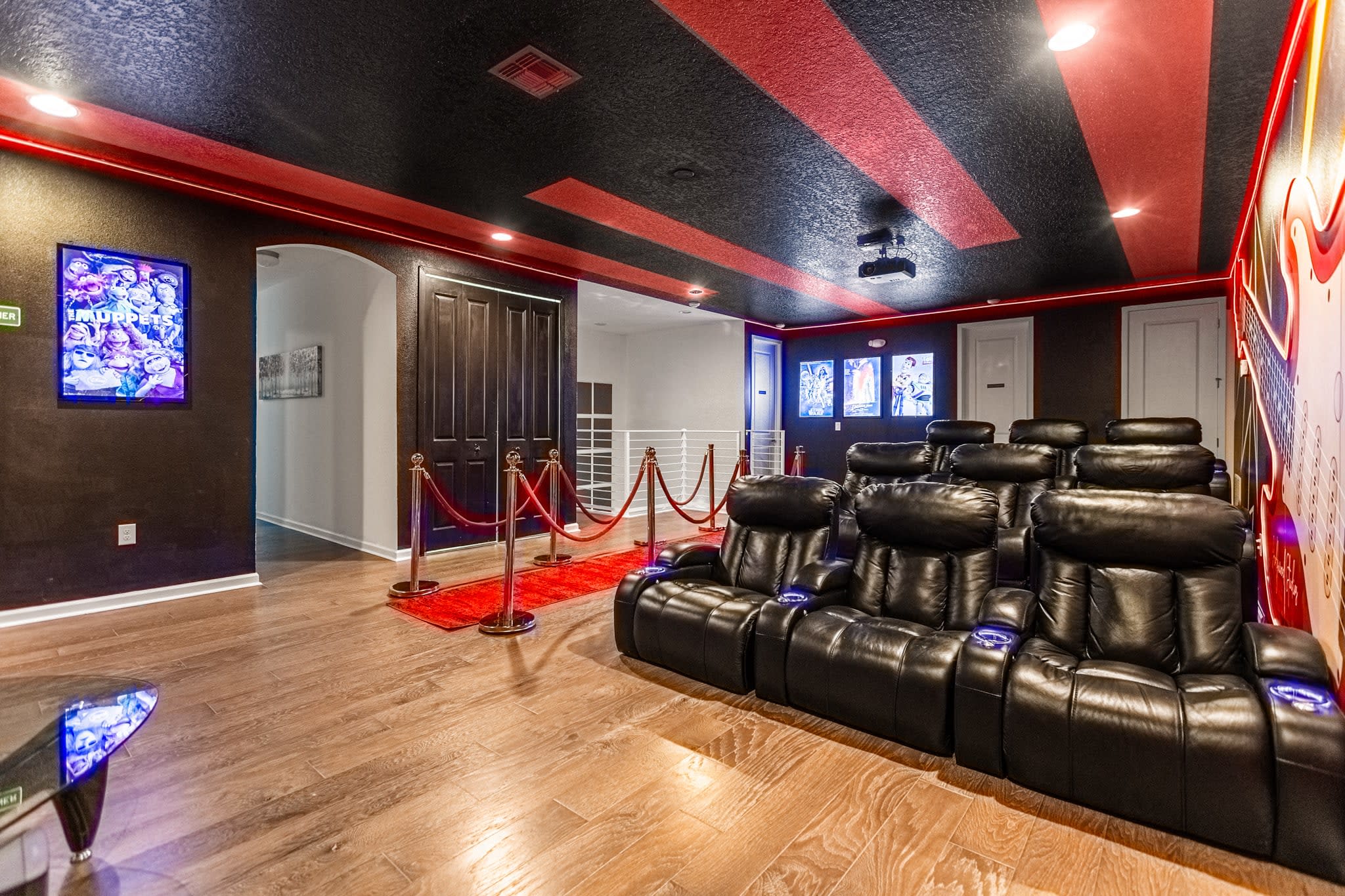Private Movie Theatre with giant projection screen and cinema style recliners