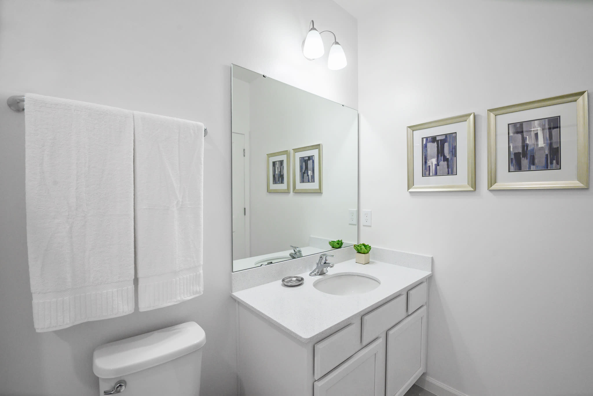 Bright Bathroom Featuring A Shower And Tub Combination With Clean Design