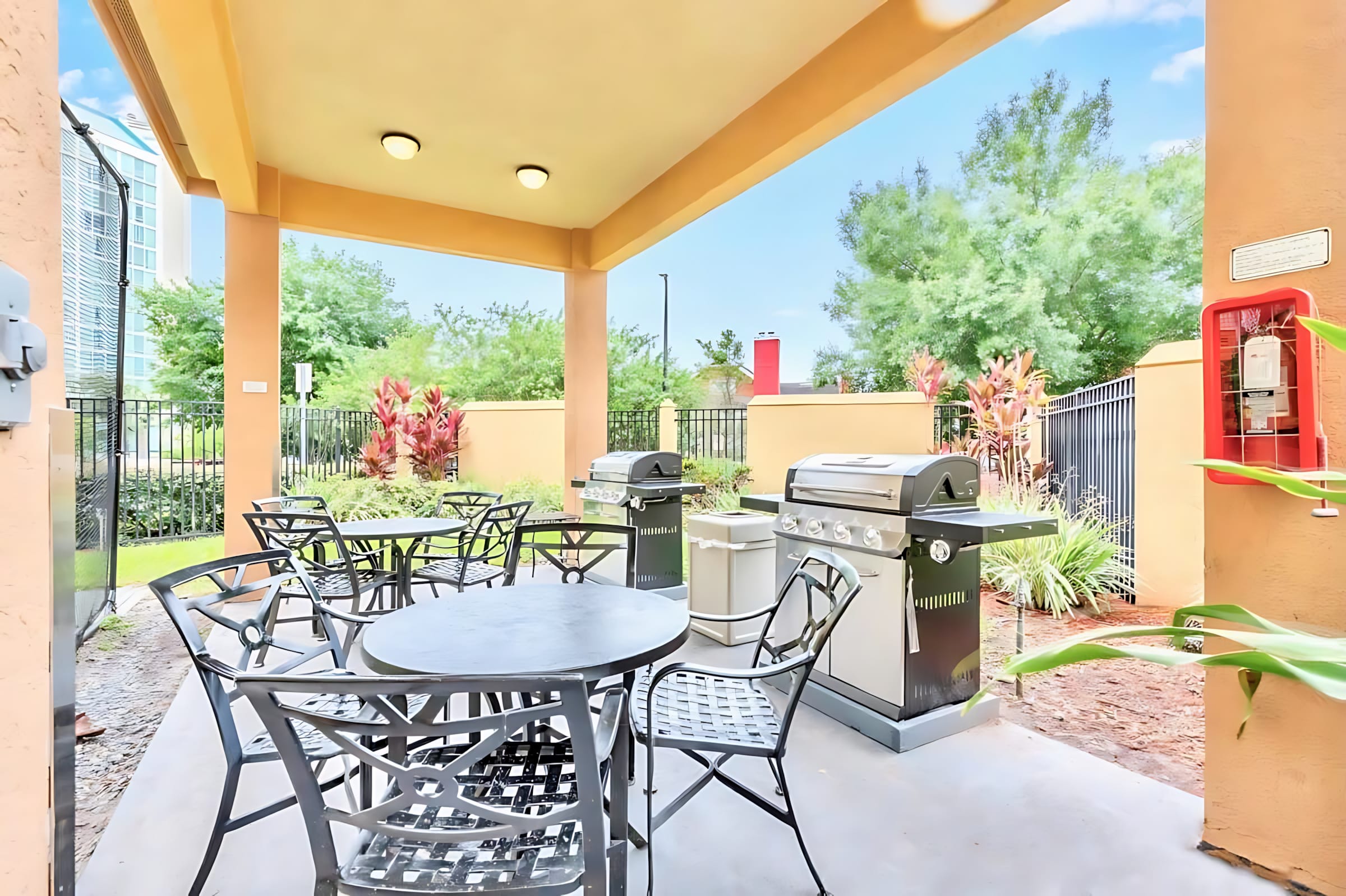 Outdoor dining area with BBQ Grill
