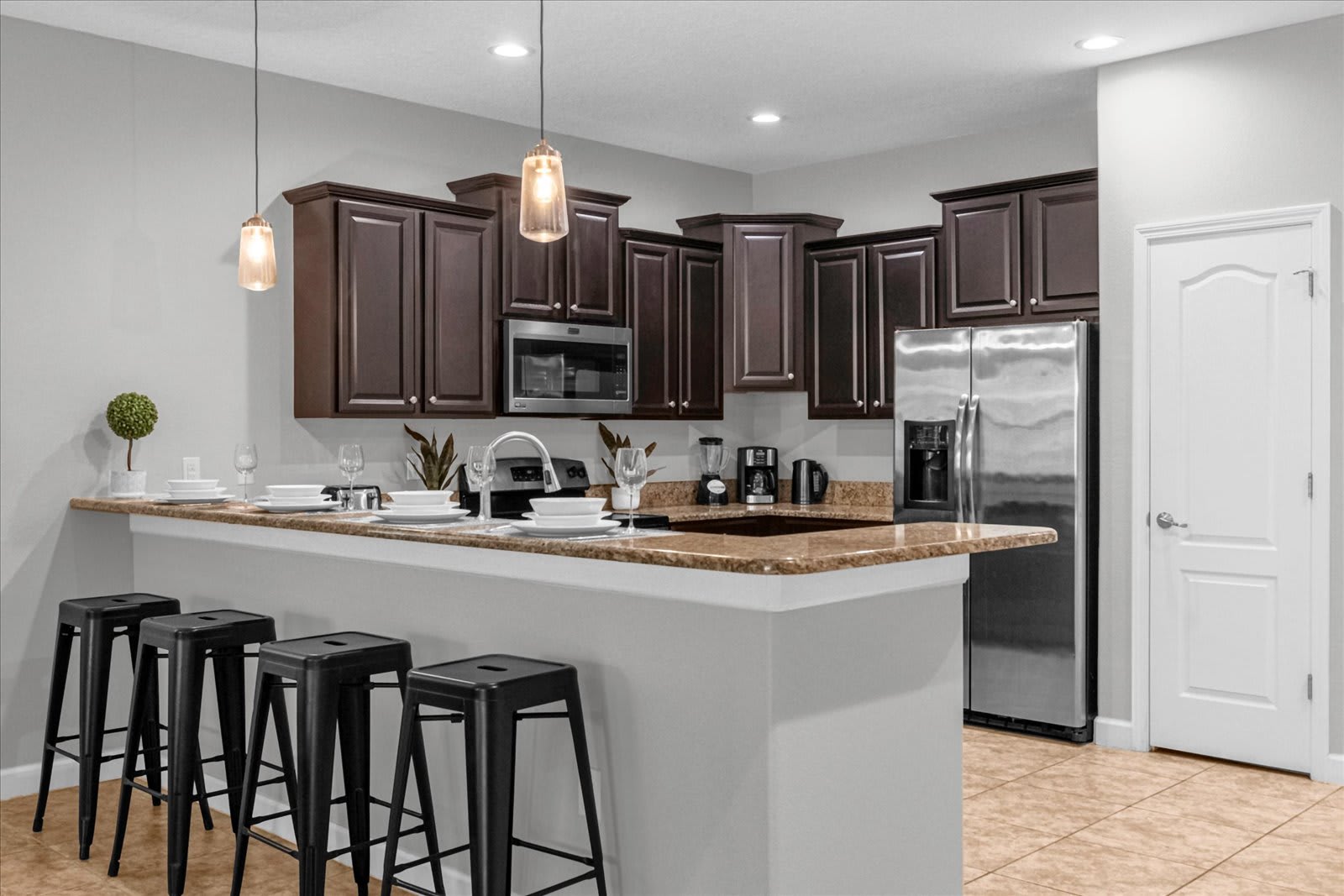 Fully Equipped Kitchen with Bar Seating