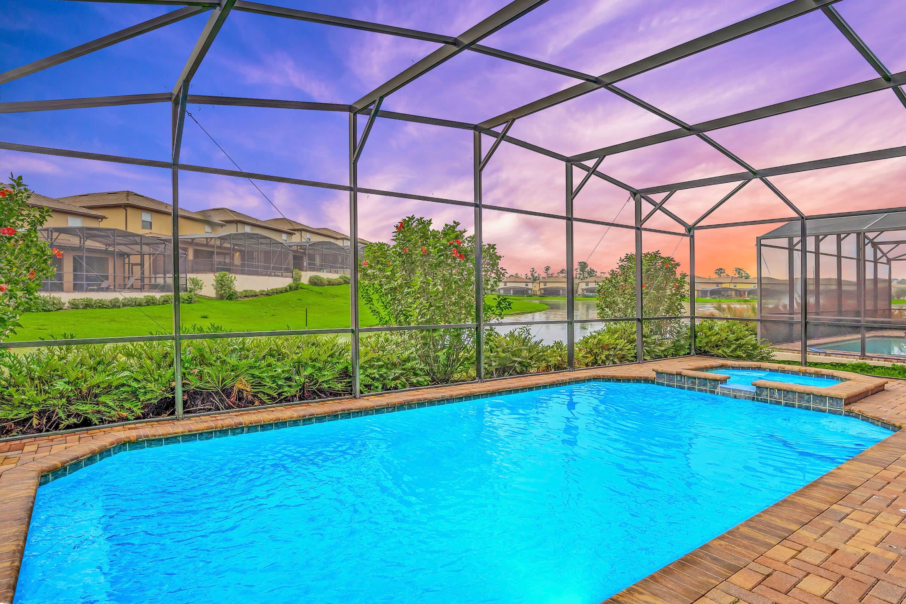 Private lake-facing screened-in back deck