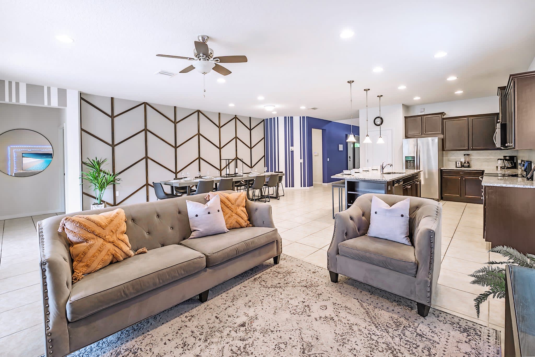 Bright And Spacious Living Area With Comfortable Seating And Modern Decor