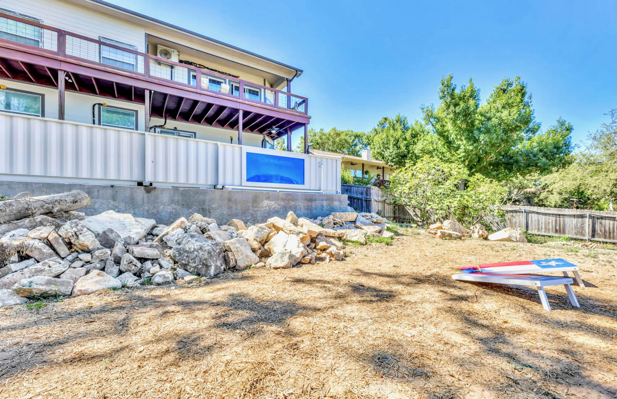 Cornhole game in the backyard
