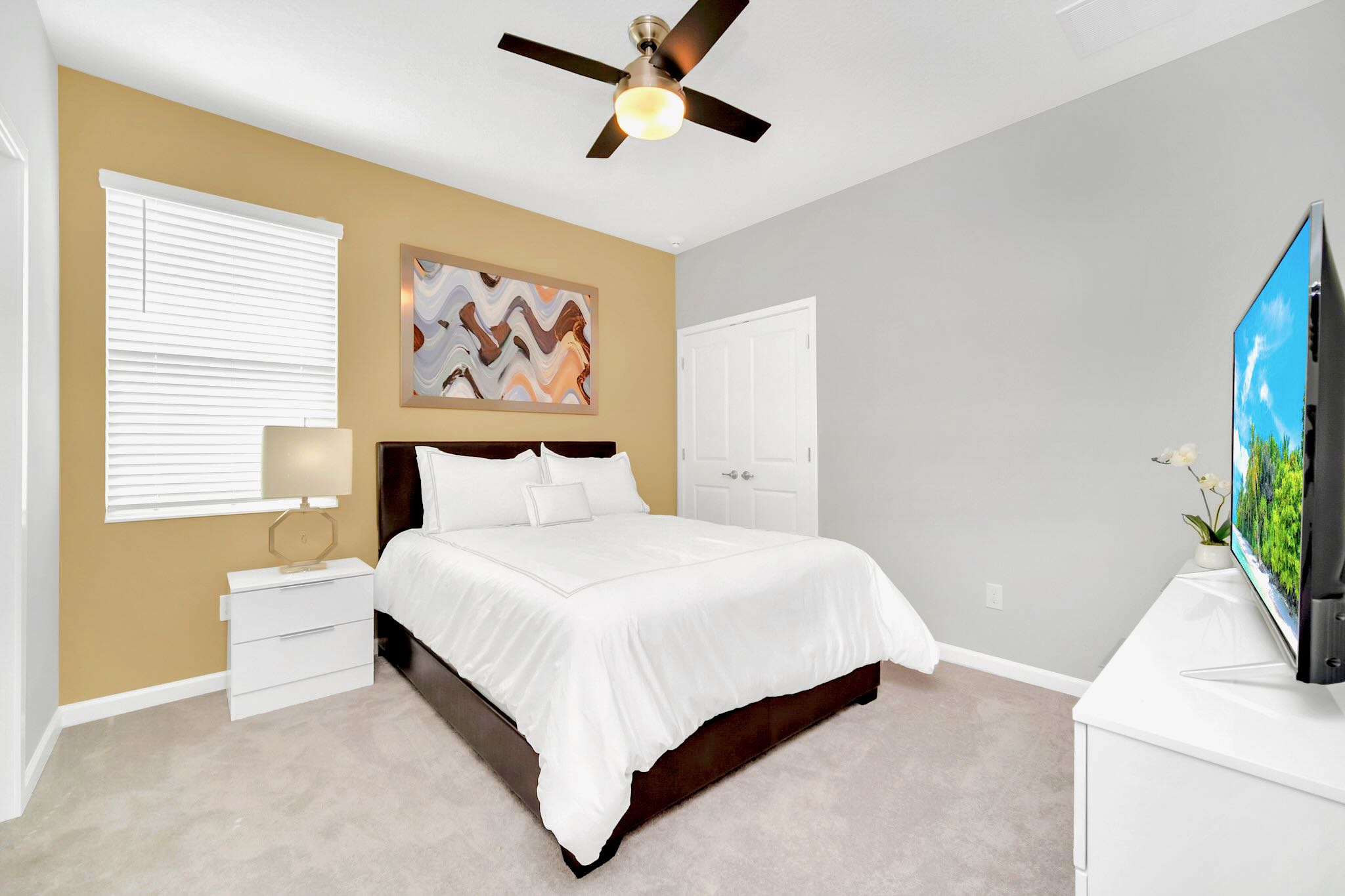 Spacious Queen Bedroom With Modern Decor And Smart TV